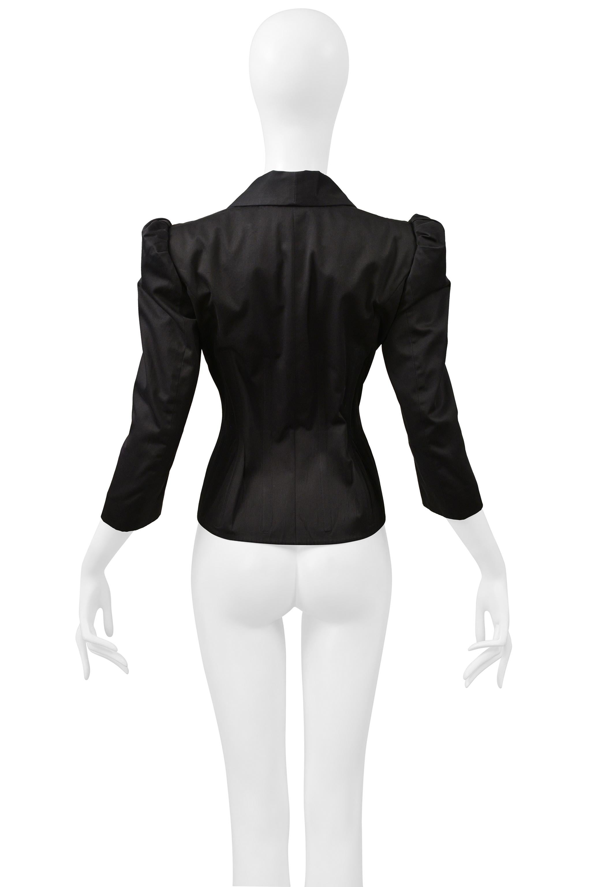 Resurrection Vintage is excited to offer a vintage Alexander McQueen black cotton cropped jacket with a fitted body, princess sleeves, single button closure, and 3/4 sleeves. 

* Alexander McQueen
* Size 40
* 100% Cotton
* 2006 Collection
* Very