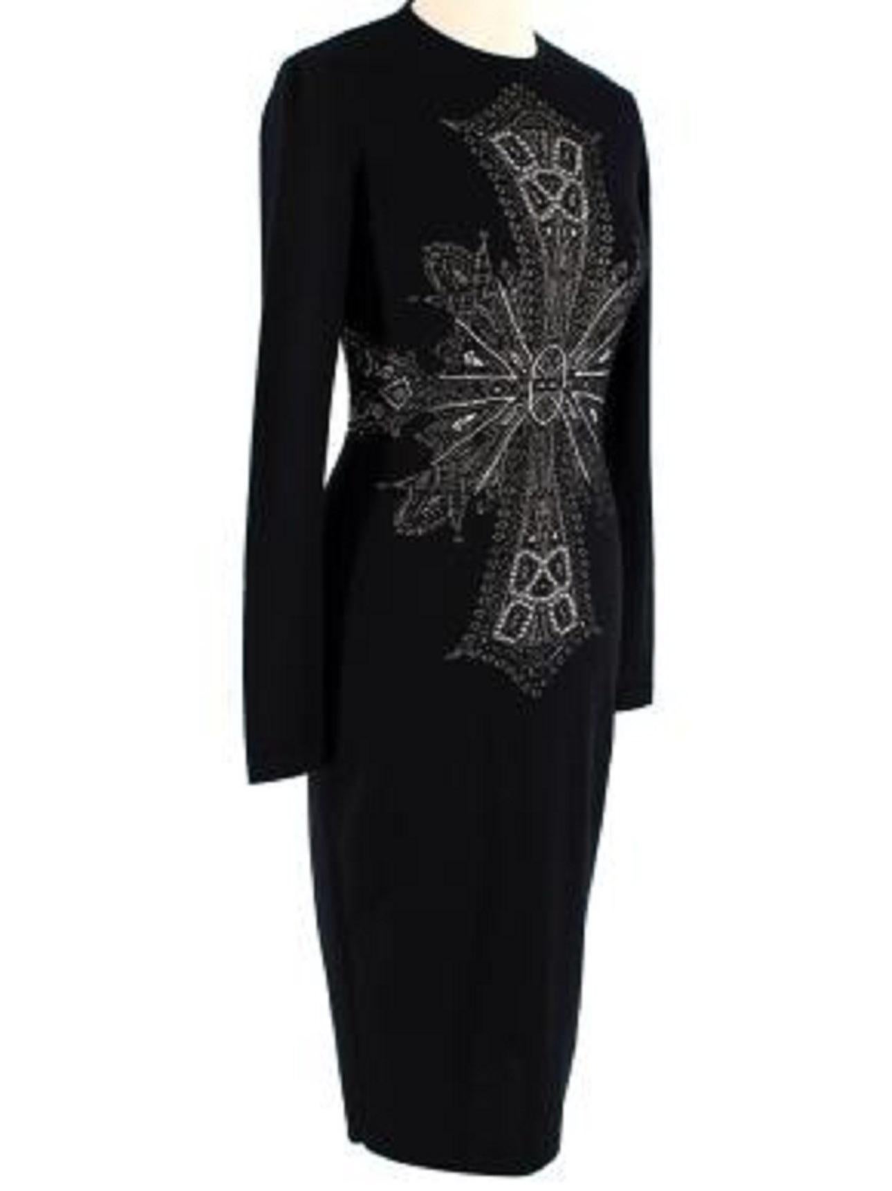 Alexander McQueen Black Fitted Knitted Dress
- Made of soft wool
- Intarsia cross detail
- fitted to the body
- Long sleeves. 

Made in Italy.
Dry clean in a laundry bag.
Condition 10/10.

PLEASE NOTE, THESE ITEMS ARE PRE-OWNED AND MAY SHOW SIGNS OF