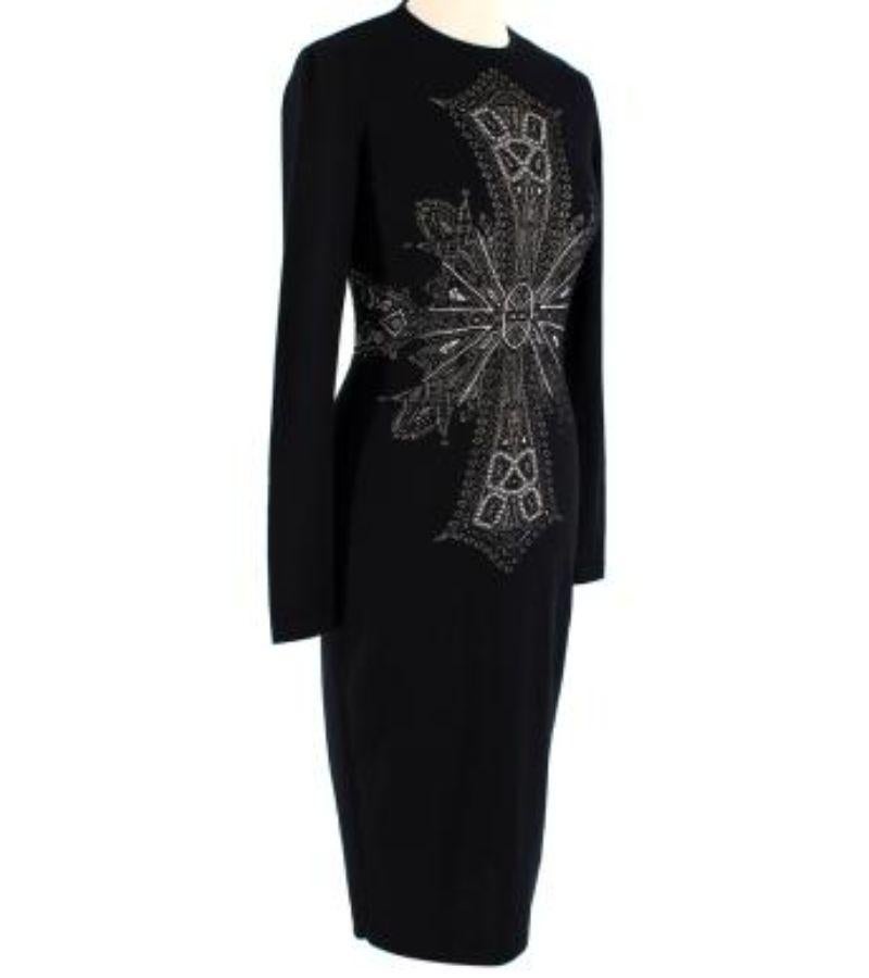 Alexander McQueen Black Fitted Knitted Dress
- Made of soft wool
- Intarsia cross detail
- fitted to the body
- Long sleeves. 

Made in Italy.
Dry clean in a laundry bag.
Condition 10/10.

PLEASE NOTE, THESE ITEMS ARE PRE-OWNED AND MAY SHOW SIGNS OF