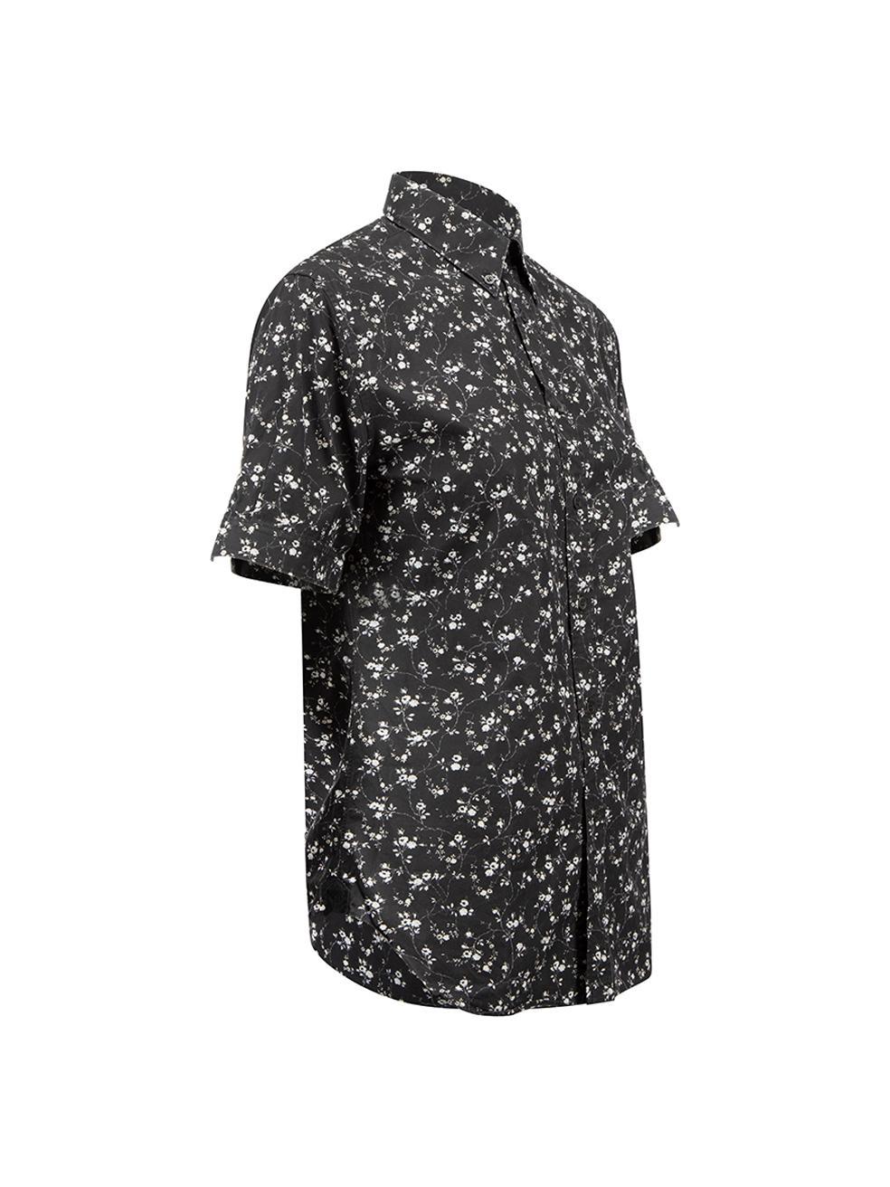 CONDITION is Very good. Minimal wear to shirt is evident. Light fading to back of collar on this used Alexander McQueen designer resale item.



Details


Black

Cotton

Shirt

White floral pattern

Short sleeves

Button up fastening





Made in