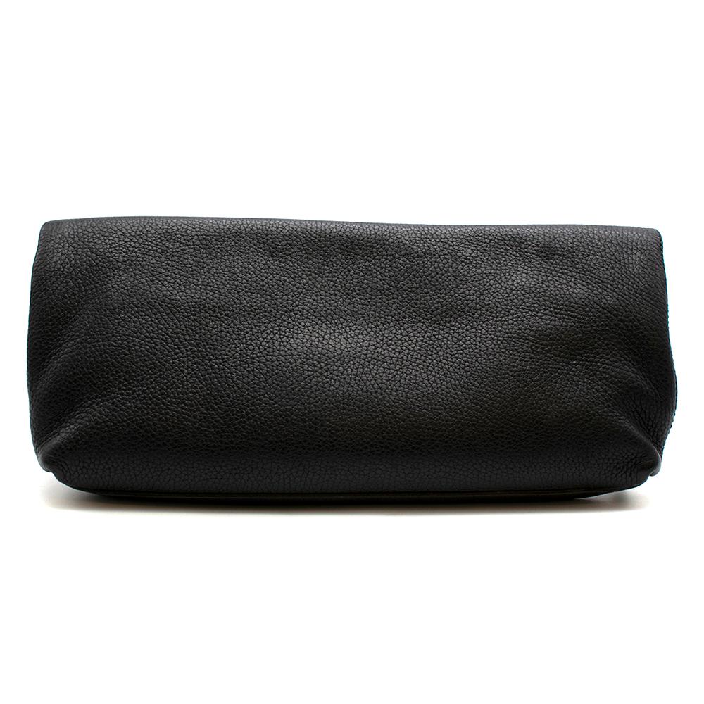 Alexander McQueen Black Clutch Bag

- Grain Leather Finish
- Gold Skull on the front of the bag
- One slip pocket in the interior of the bag
- One zip pocket in the interior of the bag 
- Black Leather Alexander McQueen Tag on the front of the