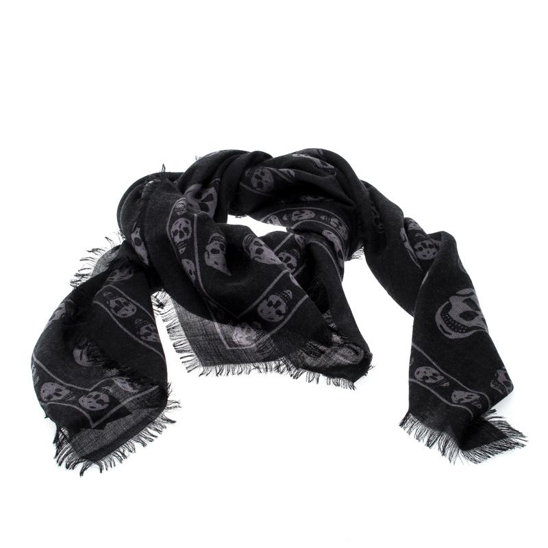 From the house of Alexander McQueen comes this edgy accessory that will highlight any outfit you choose. Created from cashmere, this scarf carries fringed edges and signature skull prints splayed over its expanse.

Includes: Original Box, Price Tag

