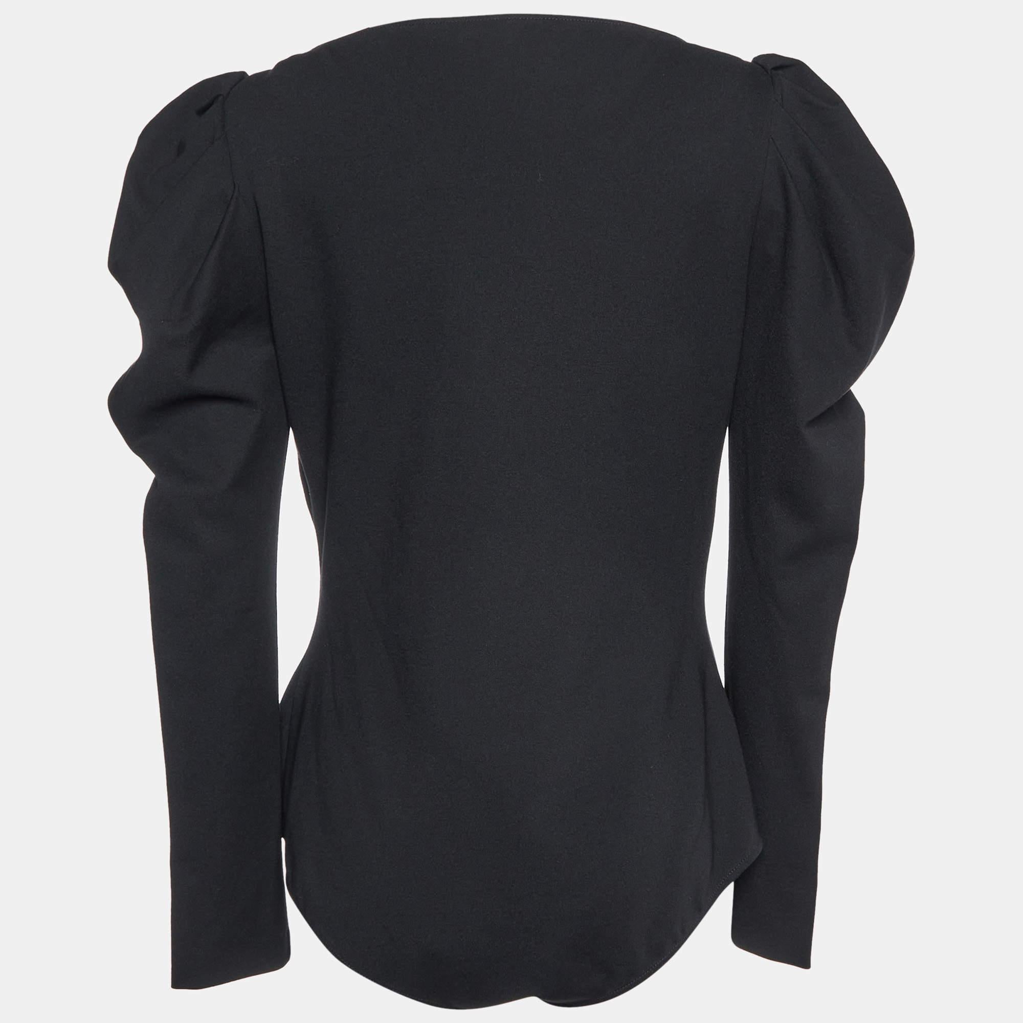 Experience effortless chic with the Alexander McQueen bodysuit. Crafted with meticulous attention to detail this bodysuit features a timeless black shade. The long sleeves add versatility making it perfect for both casual outings and stylish