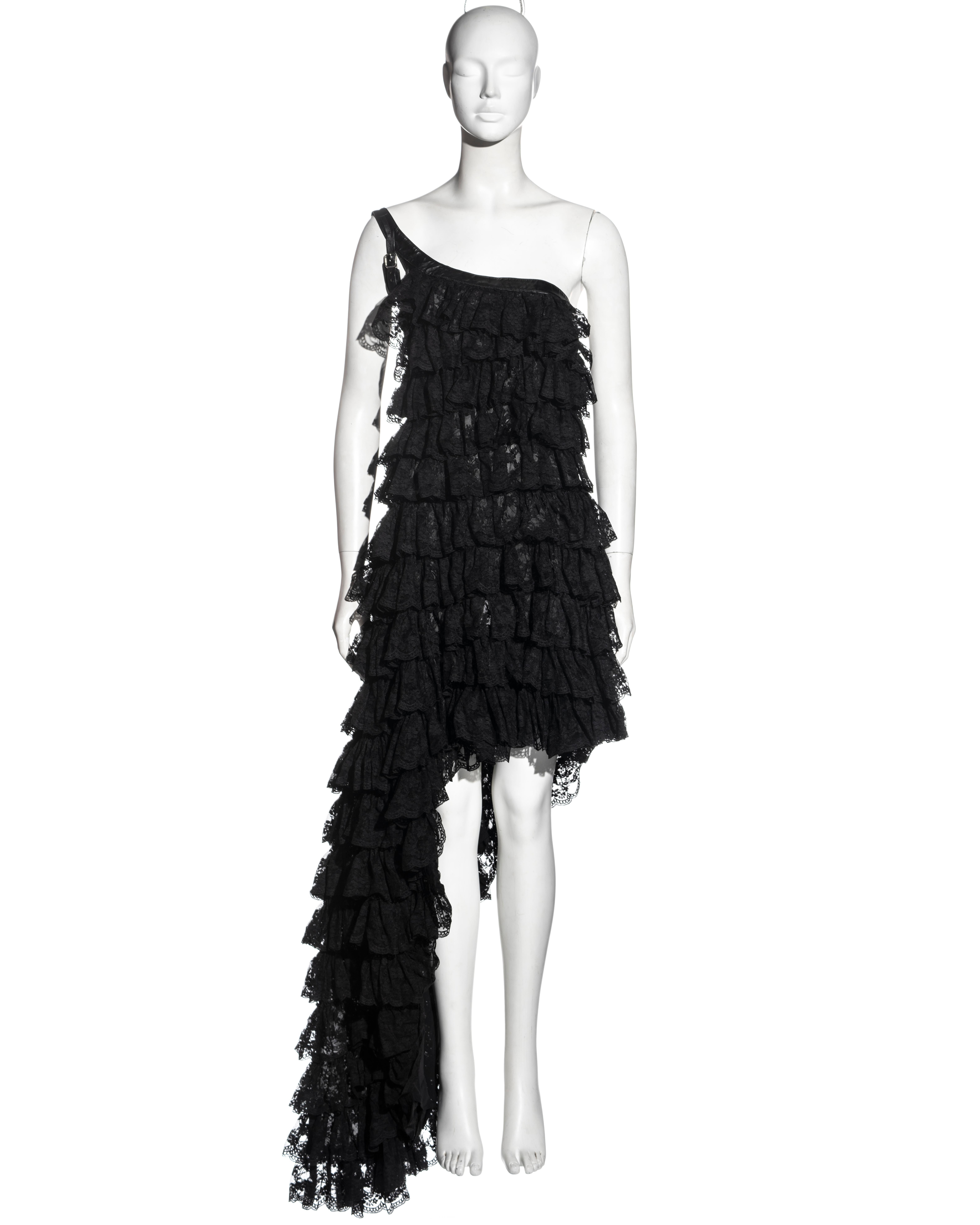 ▪ Alexander McQueen black lace evening dress
▪ Leather trim and shoulder strap with metal buckle
▪ Tiered skirt, made of several horizontal layers of lace
▪ Knee length skirt descending into a floor-length train
▪ IT 40 - FR 36 - UK 8 - US 4
▪