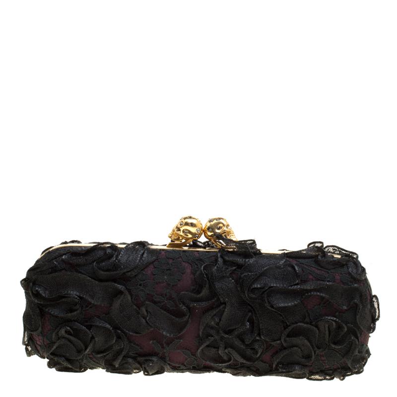 How utterly breathtaking is this clutch by Alexander McQueen! It is bold, well-crafted and overflowing with style. From the way it has been sculpted to the way it has been designed, this clutch makes a loud fashion statement with every detail. It