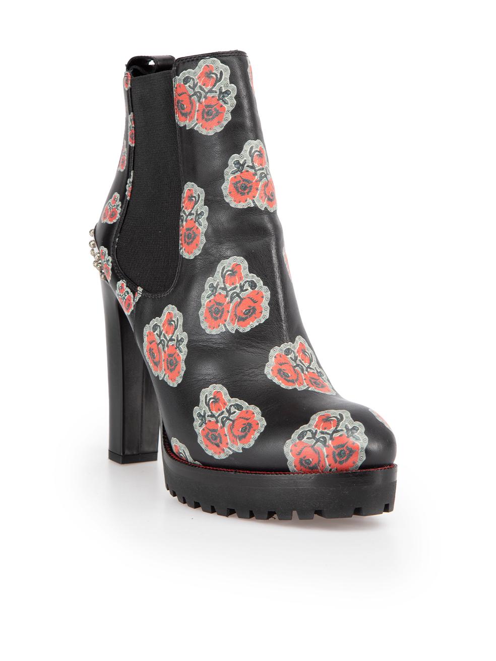 CONDITION is Very good. Minimal wear to boots is evident. Minimal scratches to the heel of the left shoe and on the front of both shoes. Small abrasions to the left side of the right shoe on this used Alexander McQueen designer resale item. This