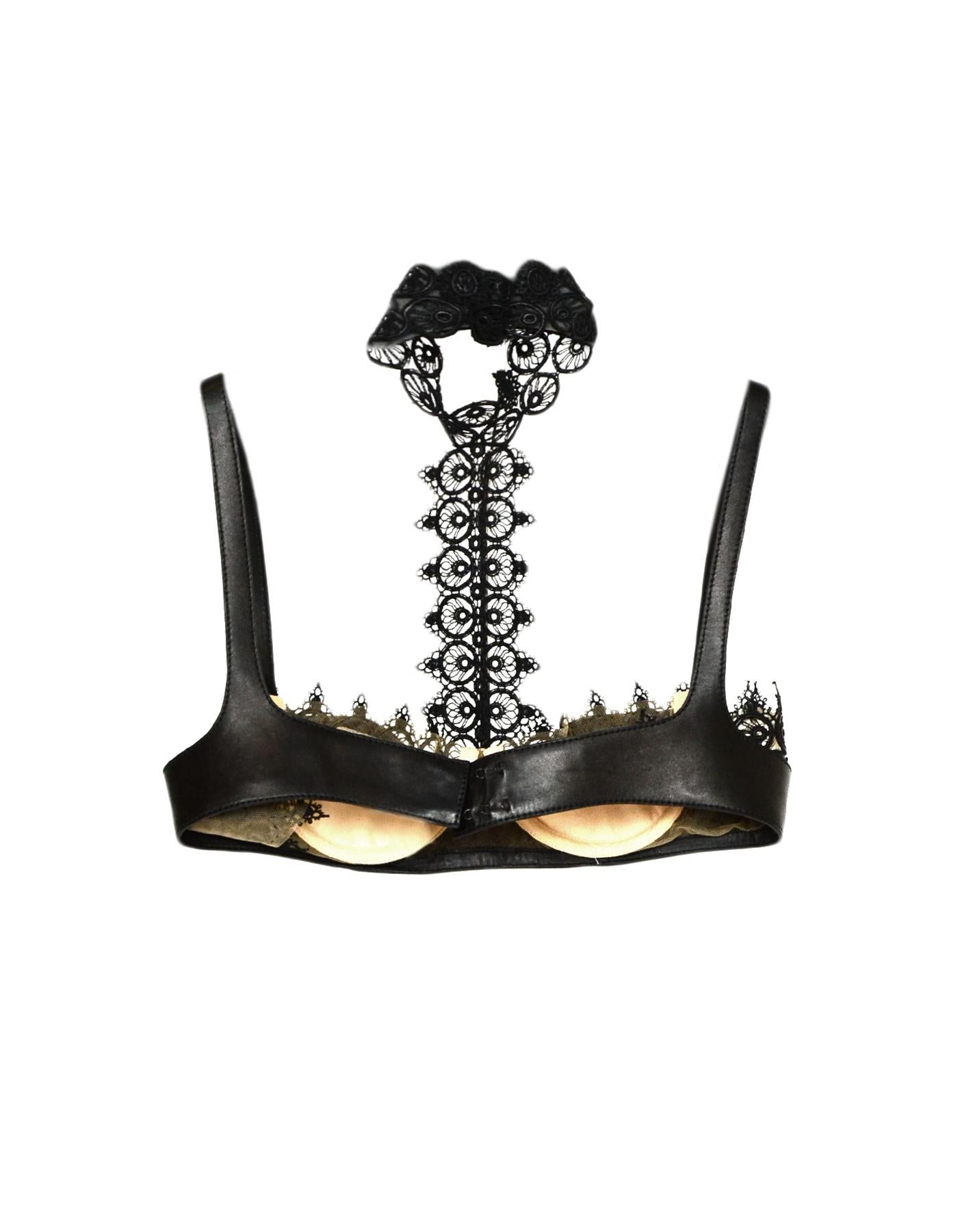 Alexander McQueen Black Leather Halter-Neck Bra Top with Lace Detail

Made In: Italy
Color: Black
Materials: Leather
Lining: Lace
Opening/Closure: Bra hook
Overall Condition: Excellent pre-owned condition
Estimated Retail: $2,775 + tax
Includes: