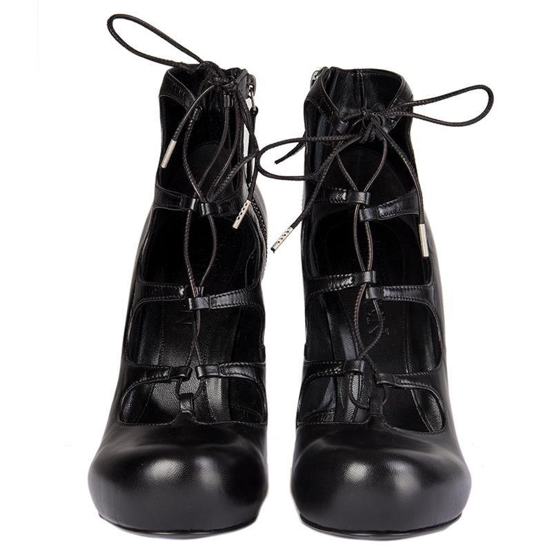 100% authentic Alexander McQueen lace-up cut-out boots and black leather. Open with a zipper on the inside. Brand new. Come with dust bag. 

Measurements
Imprinted Size	39.5
Shoe Size	39.5
Inside Sole	26cm (10.1in)
Width	7.5cm (2.9in)
Heel	13cm
