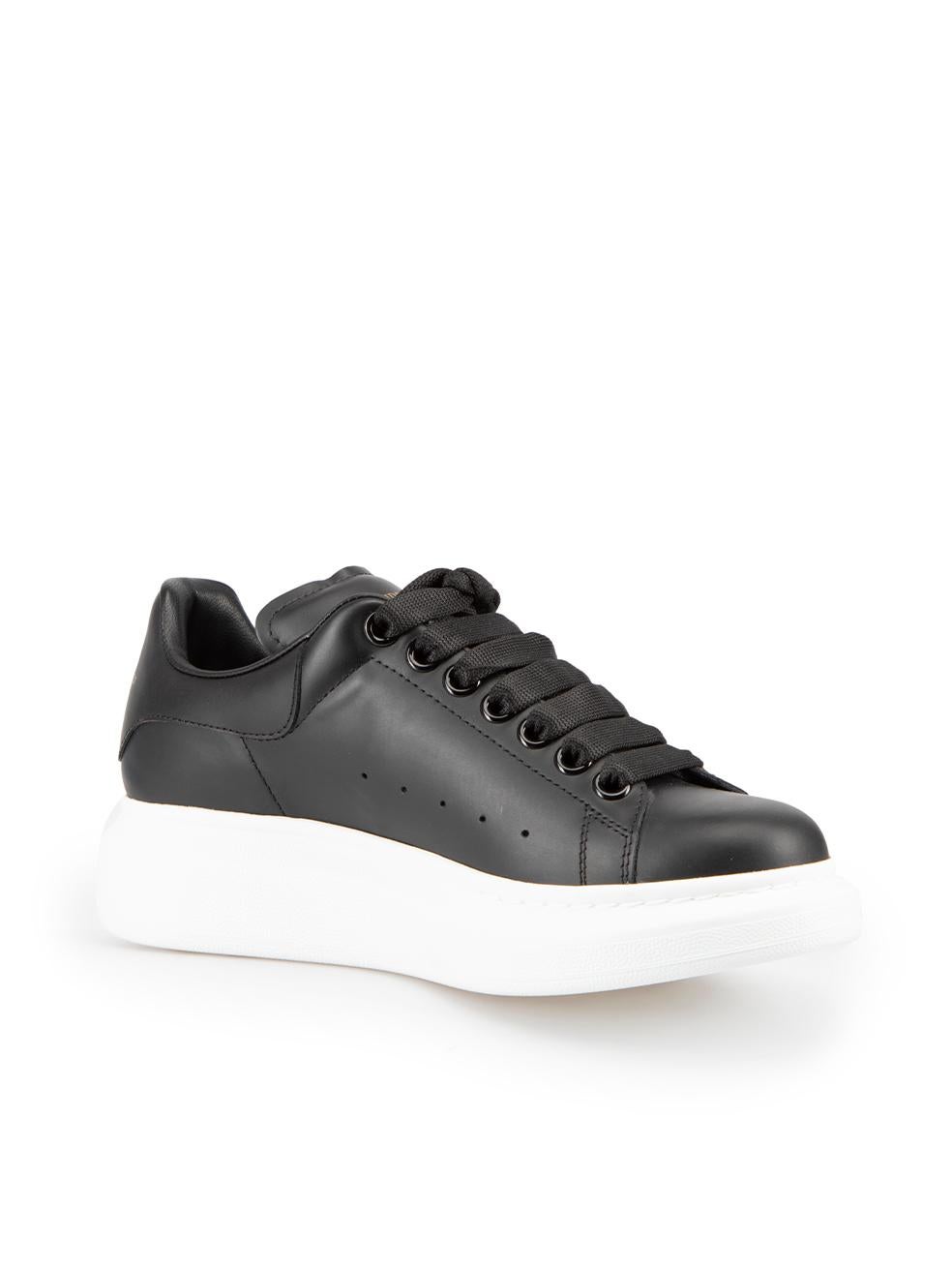CONDITION is Never Worn. No visible wear to trainers is evident on this used Alexander McQueen designer resale item.
  
Details
Black
Leather
Oversized model
Low top trainers
Lace up closure
Round toe
Platform heel
Rubber sole
Branded logo on back
 