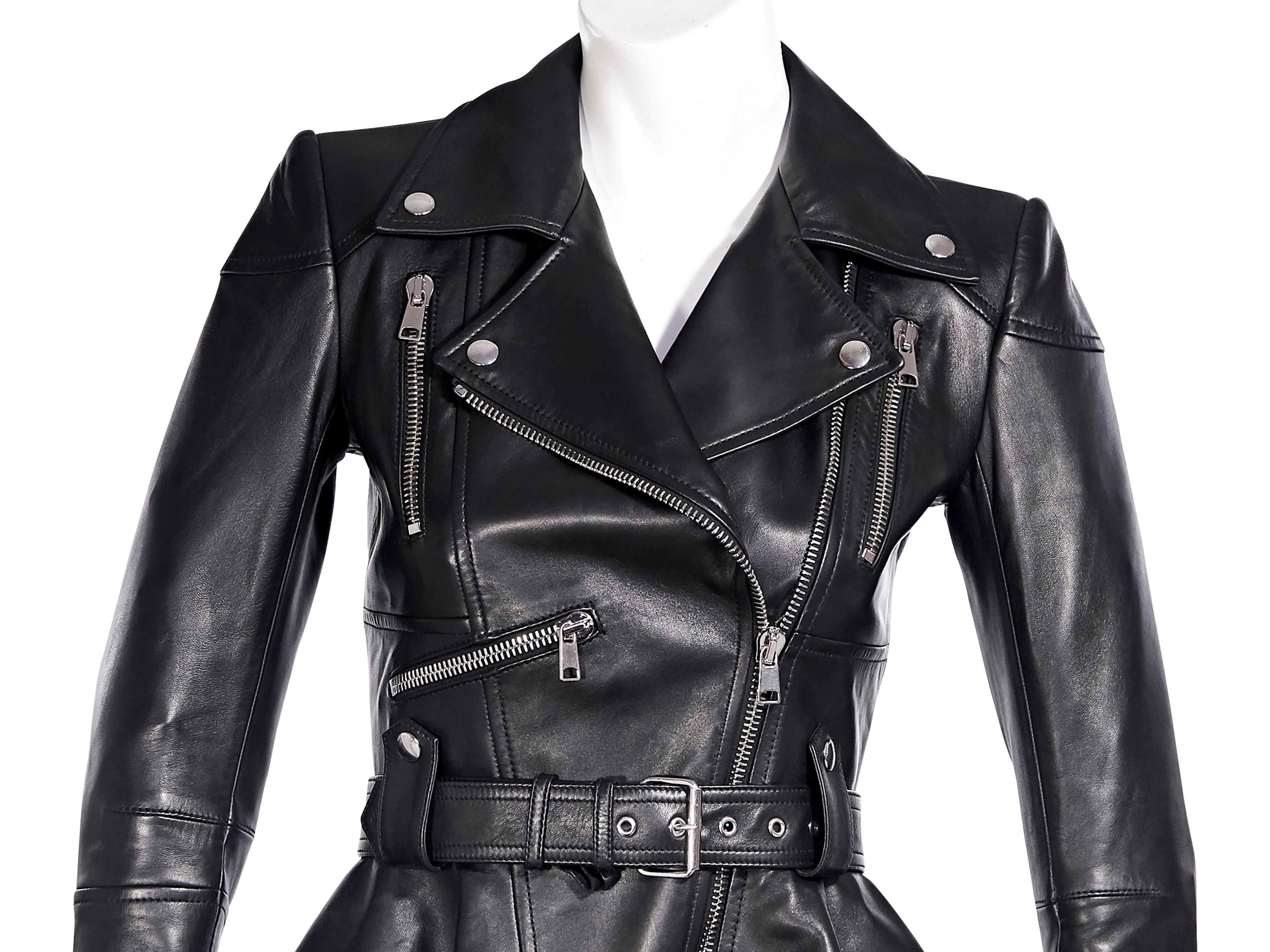 Product details:  Black leather peplum jacket by Alexander McQueen.  Notched lapel.  Long sleeves.  Asymmetrical zip-front closure.  Adjustable belted waist.  Chest and waist zip pockets.  Silvertone hardware.  32