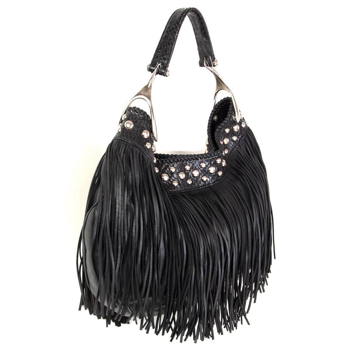 Alexander McQueen 'Wishbone Fringe Hobo' shoulder bag in black smooth calfskin featuring silver-tone studs with python top part and handle. Opens with a hidden magnetic button and is lined in black canvas with one zipper pocket against the back. Has