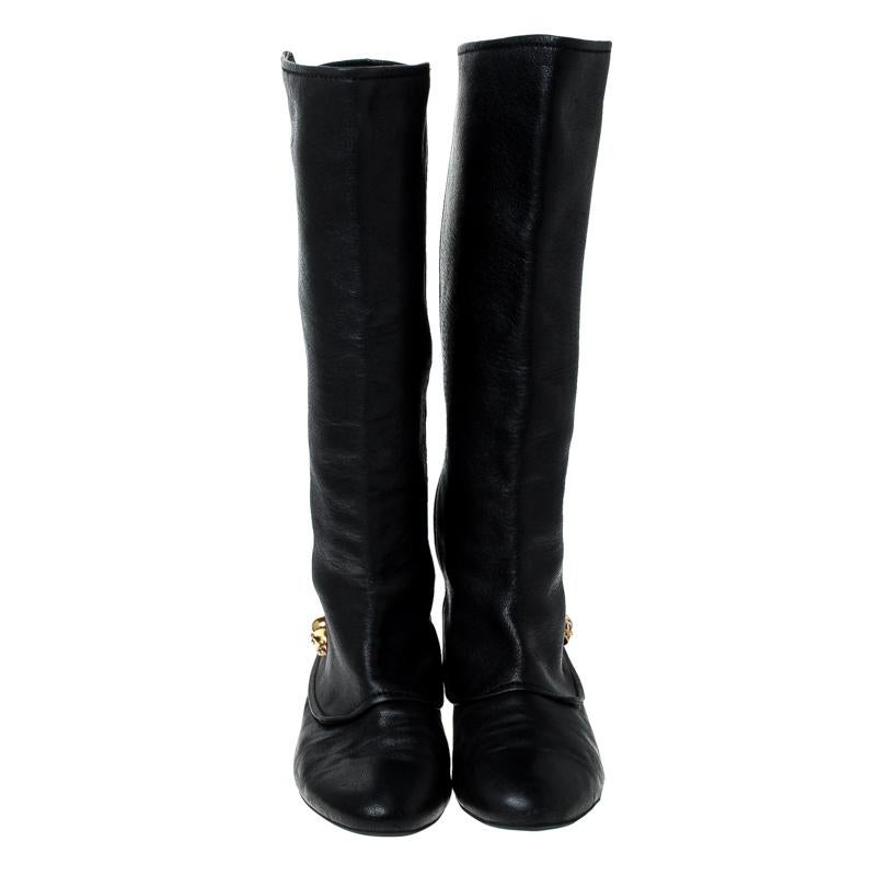 Creations as fashionable as this pair of knee-length boots from Alexander McQueen deserves to be in every woman's closet. They've been created from black leather and designed with round toes, signature skull charms and tough soles.

Includes: