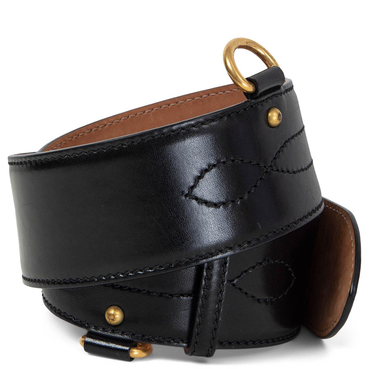 100% authentic Alexander McQueen waist belt in black leather with gold-tone hardware and decorative tonal top stitching. Has been worn and is in excellent condition. 

Measurements
Tag Size	75
Size	75cm (29.3in)
Width	5.5cm (2.1in)
Fits	68cm