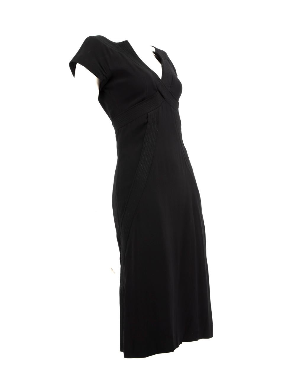 CONDITION is Very good. Minimal wear to dress is evident. Light discolouration to the left underarm lining and the brand label has been partly detached on this used Alexander McQueen designer resale
