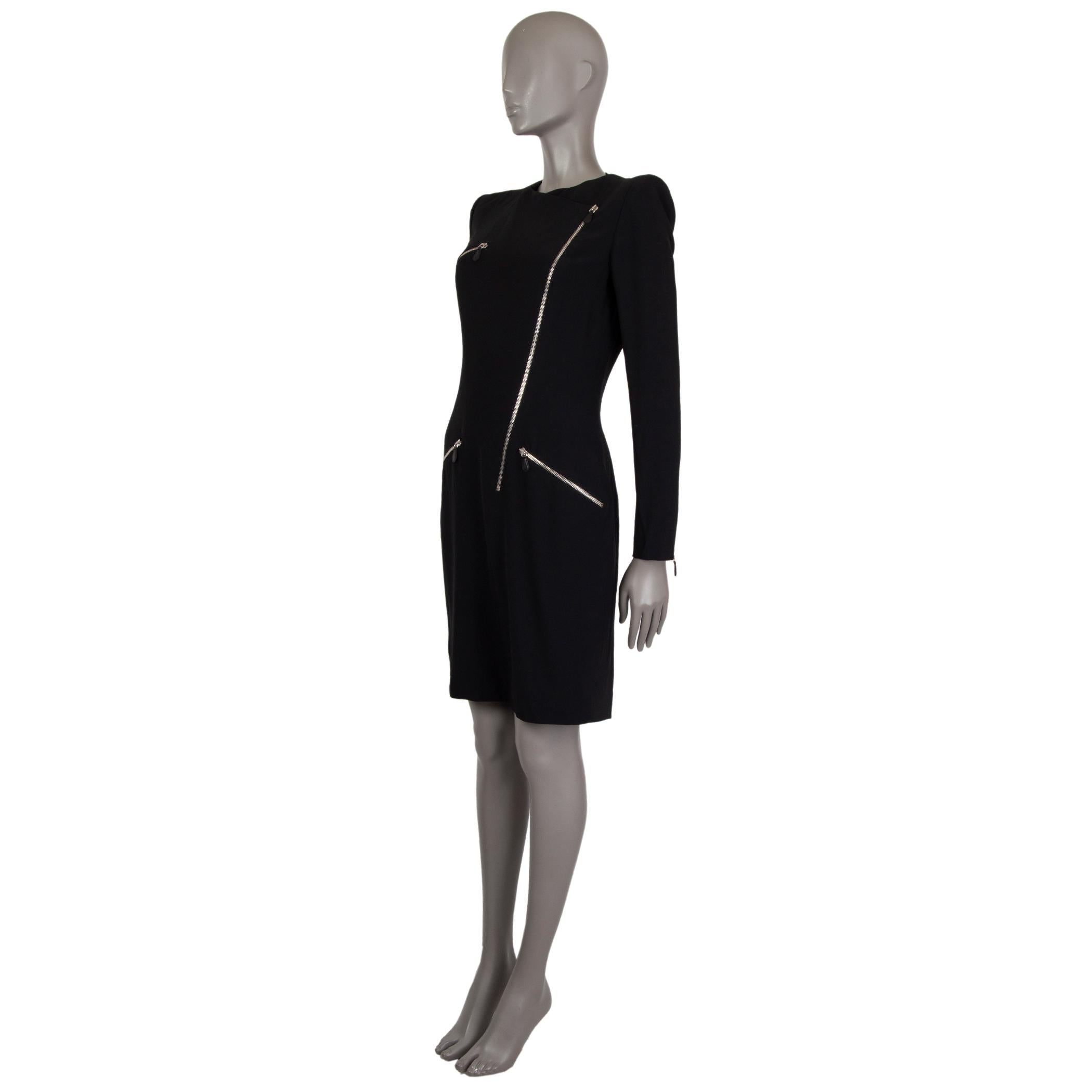 Alexander McQueen cross-zipper long-sleeve dress in black acetate (50%) and viscose (50%) with an asymmetrical neckline. Has one chest zipper and two frontal asymmetrical zippers. Closes with a silver tone zipper on the front. Lined in acetate (74%)