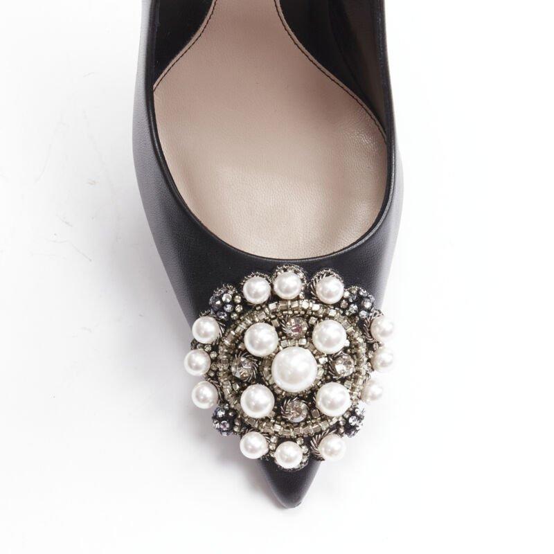ALEXANDER MCQUEEN black pearl metal embellished stiletto pumps EU39 US9
Reference: AAWC/A00128
Brand: Alexander McQueen
Material: Leather
Color: Black
Pattern: Solid
Closure: Slip On
Lining:  Leather
Made in: Italy

CONDITION:
Condition: Very good,