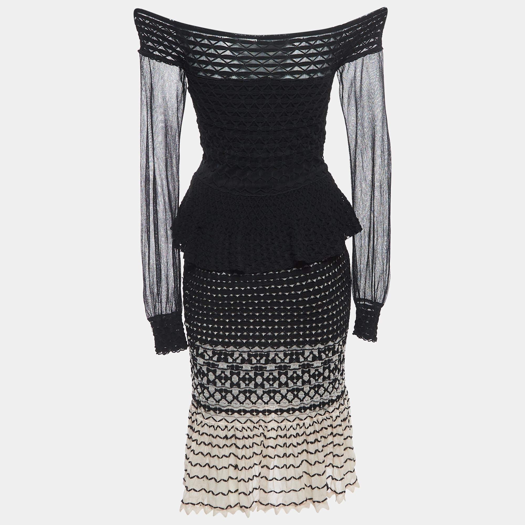 Effortlessly made into a chic design, this Alexander McQueen dress is easy to wear and easy to accessorize. Tailored beautifully, the dress is sure to remain a favorite season after season.

