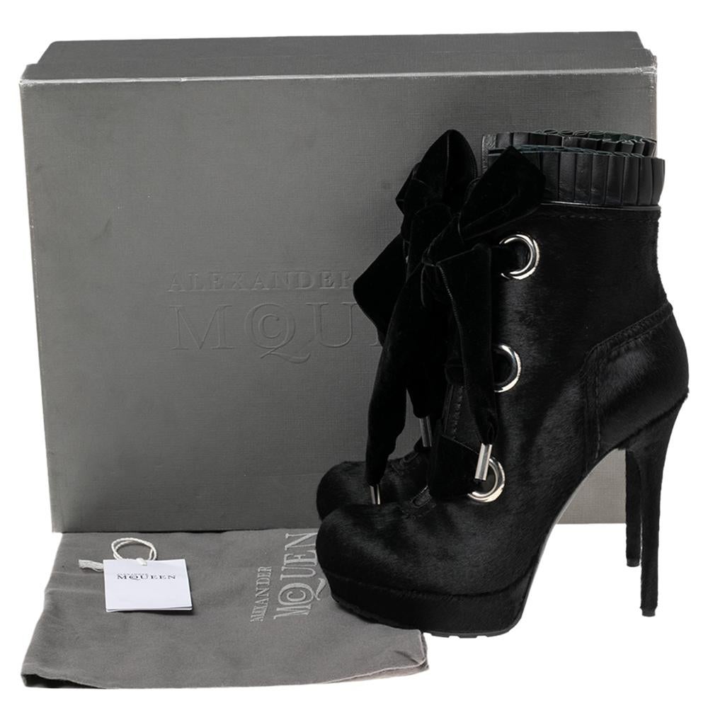 These pony hair booties are the most stylish thing you will ever have. Round toes and high, stiletto heels make these boots look extremely fashionable. This pair of exclusively crafted boots by Alexander McQueen has ribbon lace-ups on the vamps and
