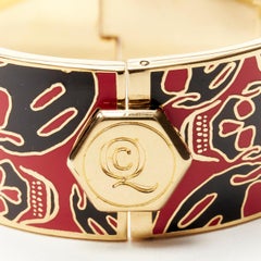 ALEXANDER MCQUEEN black red skull enamel gold tone brass bangle cuff