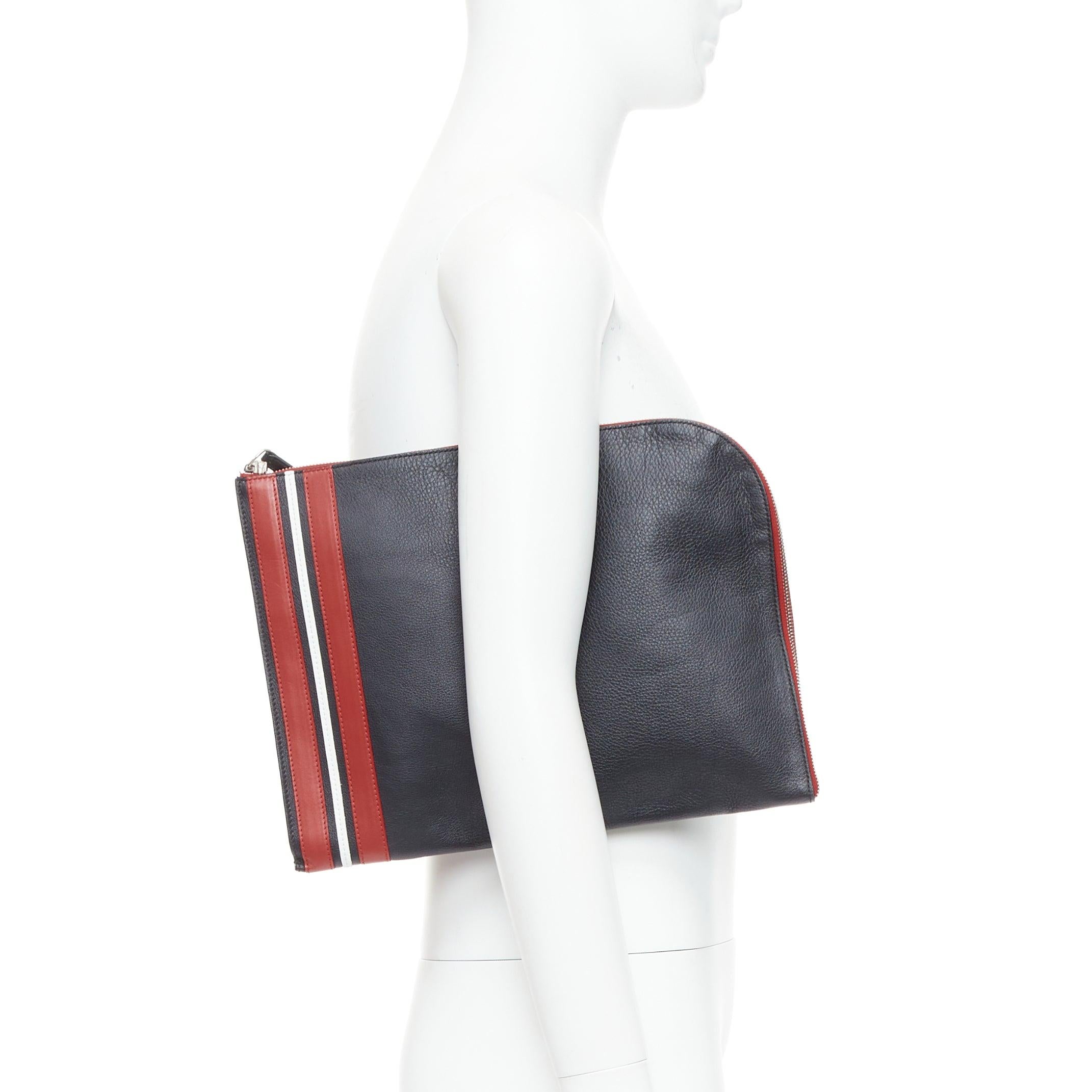 ALEXANDER MCQUEEN black red stripes leather portfolio clutch bag
Reference: PRCG/A00082
Brand: Alexander McQueen
Material: Leather
Color: Black, Red
Pattern: Striped
Closure: Zip
Lining: Red Fabric
Extra Details: Discreet logo front.
Made in: