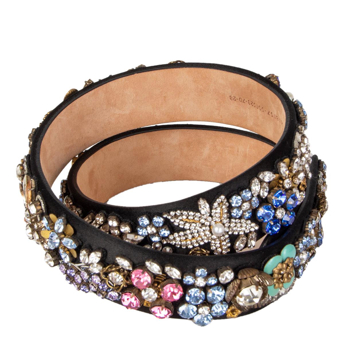 Alexander McQueen waist belt in black satin embellished with light-blue, bright-pink and clear crystals, faux pearls and burnished gold beads arranged in the shape of flowers. Backed in smooth leather and has adjustable snap fastenings at the front.