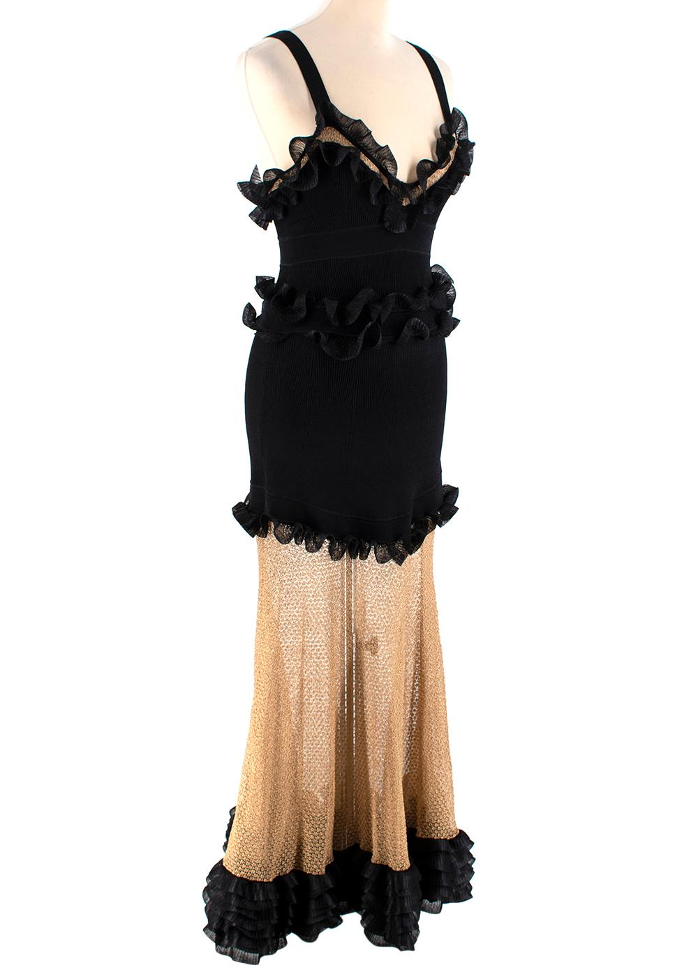 Alexander McQueen Black Silk-blend And Mesh Dress

- Mesh Knit dress 
- Colour block black & gold panels
 - Ruffles to the bust, waist, hips & hem
- Ruffled tie 
- Sweetheart collar
- Black zip on the side

Materials: 
34% silk
33% rayon
16%