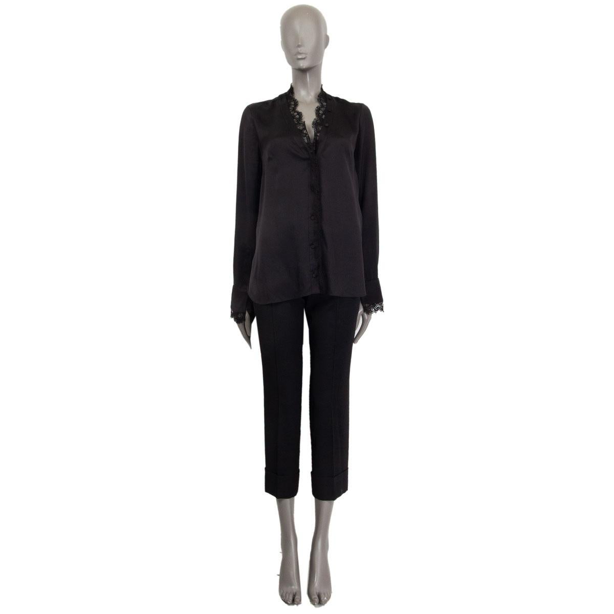 100% authentic Alexander McQueen lace trim blouse in black silk (100%), cotton (72%) and polyamide (28%) with v-neck and long sleeve. Closes with buttons on the front and has buttoned cuffs. Unlined. Has been worn and is in excellent