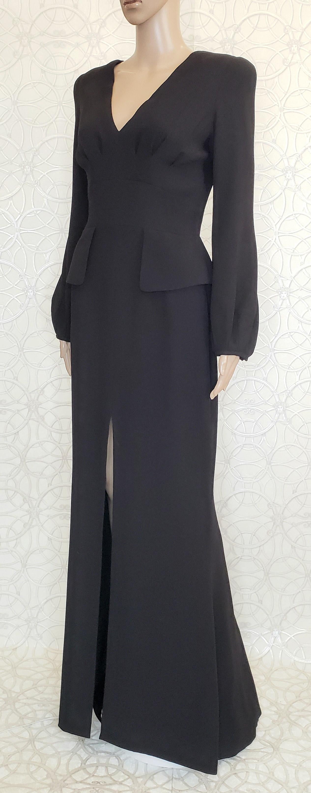 
 Alexander McQueen 

Black Alexander McQueen dress.

Front cutout

V-neck


Content: 100% silk


Size: IT 40 - US 4
Size: IT 40 - US 4

Armpit to armpit 17