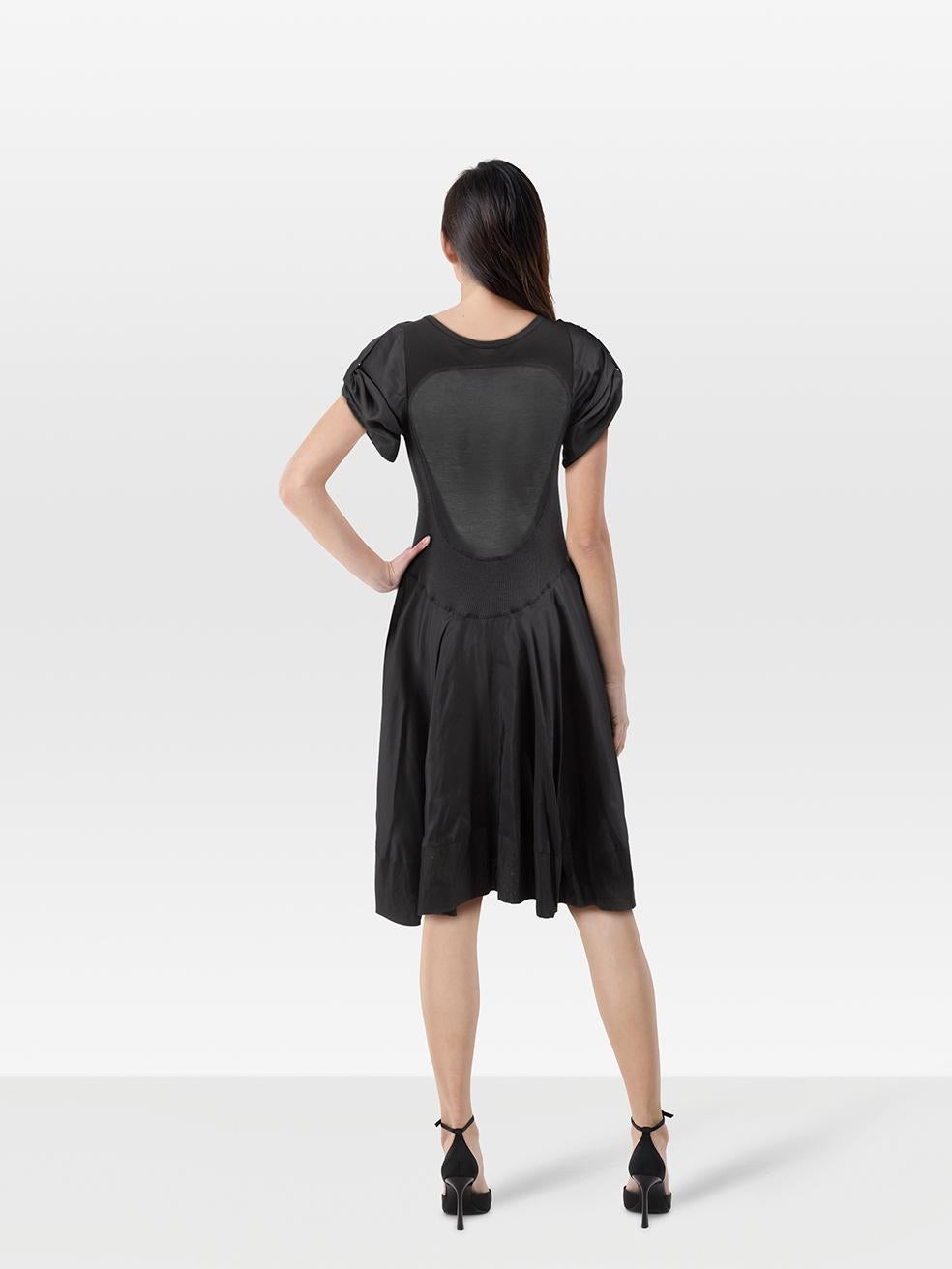CONDITION is Very good. Minimal wear to the dress is evident. Pluck to the weave on the front right and lower back. Discolouration under both armpits on this used Alexander McQueen designer resale item. Discolouration may need gentle hand wash