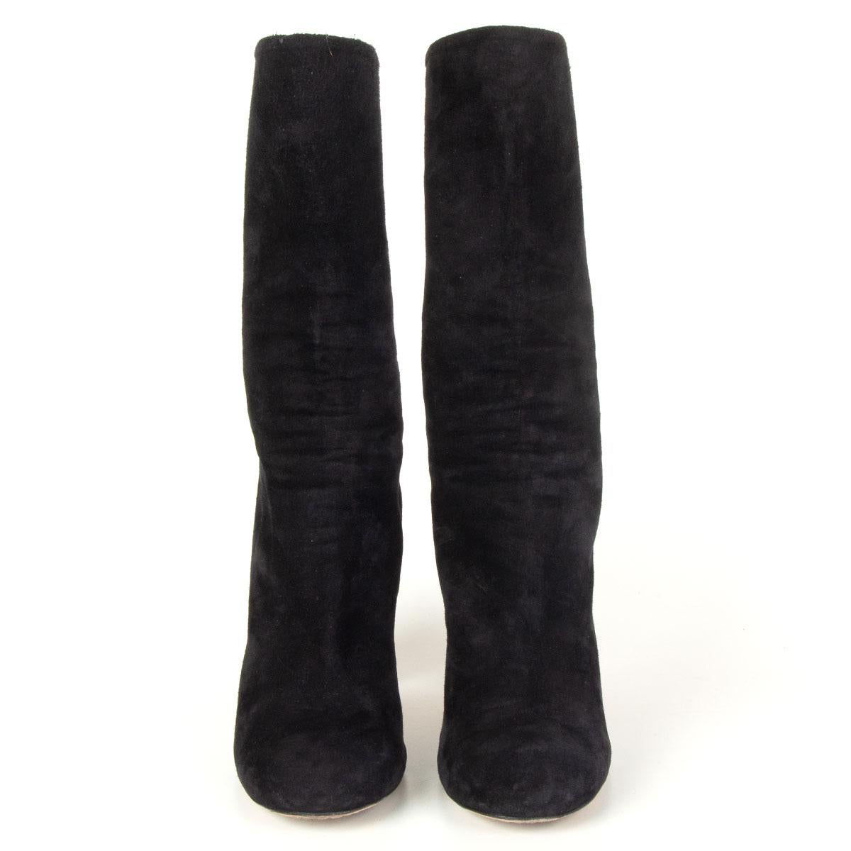 100% authentic Alexander McQueen round-toe mid-calf boots in black soft suede with a metallic silver heel that's spliced with gold. Zip fastening along back. Have been worn and are in excellent condition. 

Measurements
Imprinted Size	37.5
Shoe