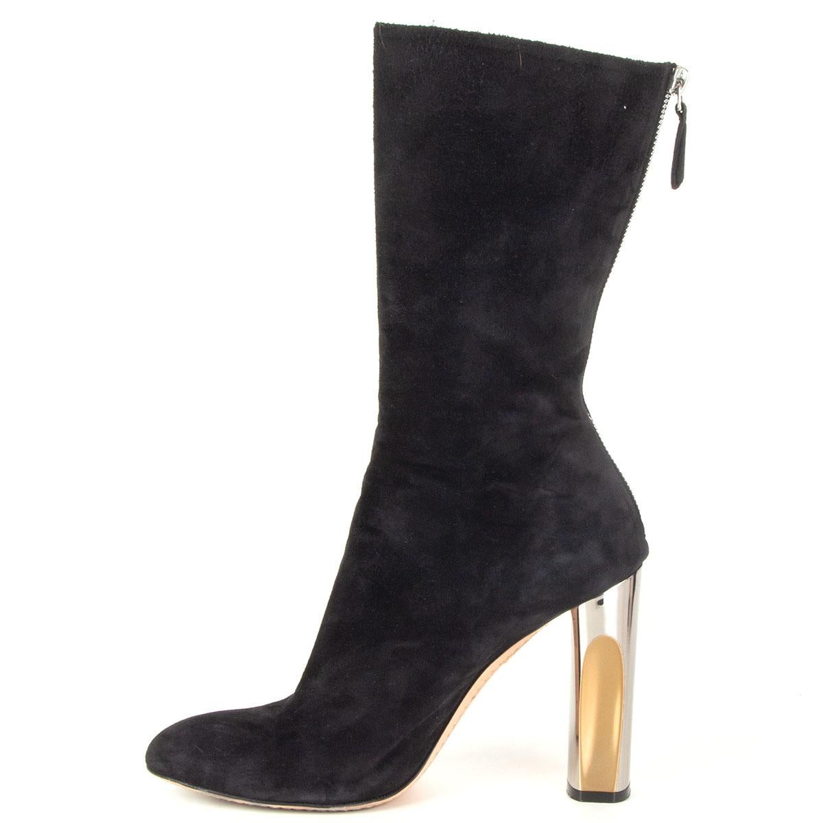 Nero ALEXANDER McQueen nero in pelle scamosciata con tacco metallico Scarpe 37,5 in vendita