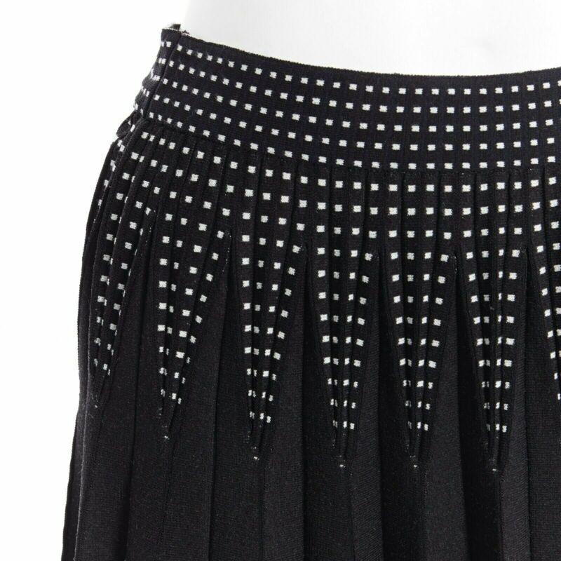 ALEXANDER MCQUEEN black white dot jacquard knit pleated flare midi skirt IT42 M
Reference: TGAS/A03219
Brand: Alexander McQueen
Material: Viscose
Color: Black, White
Pattern: Other
Closure: Zip
Extra Details: Jacquard knit. Pleated midi flare skirt.