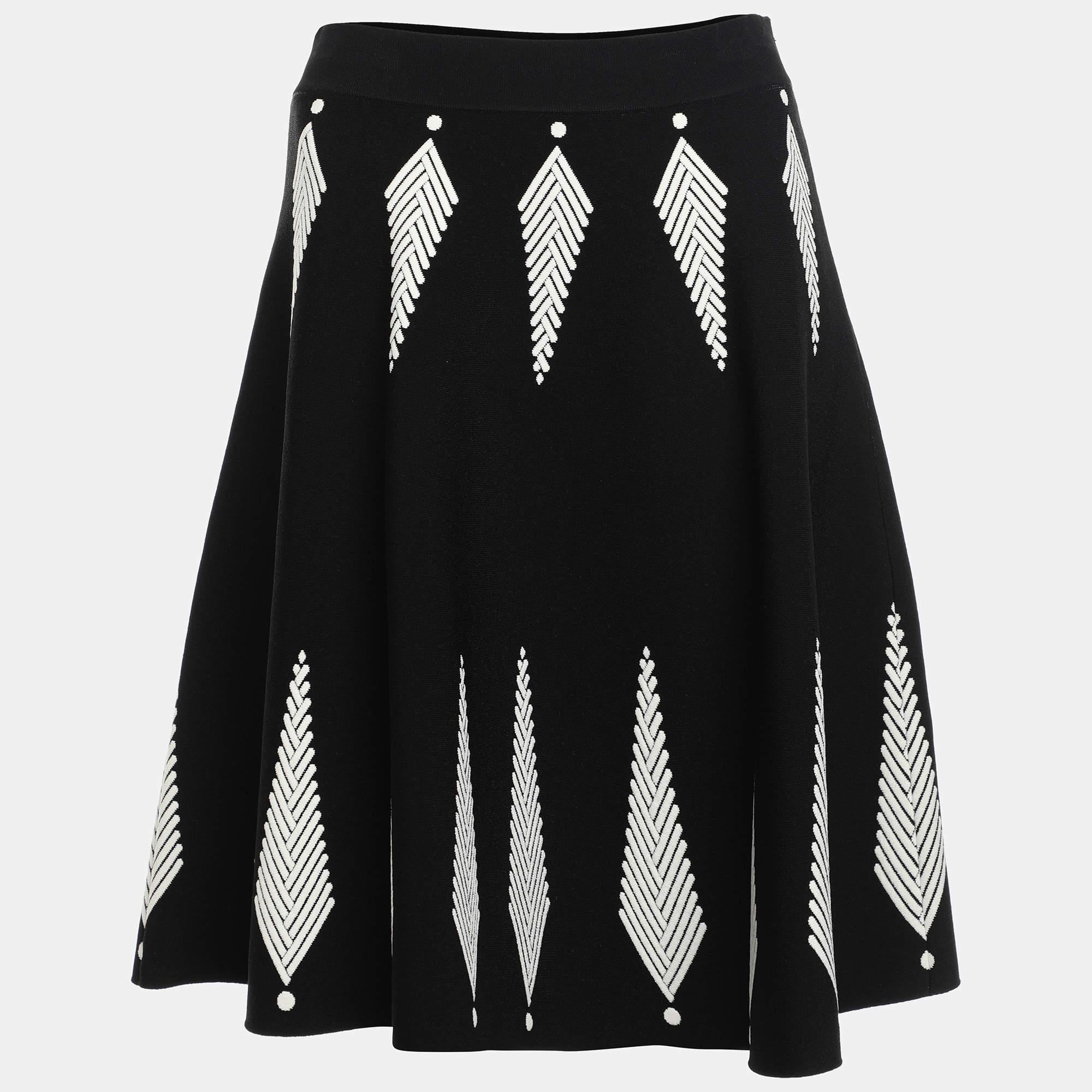 This elegant skirt is worth adding to your closet Crafted from fine materials it is exquisitely designed into a flattering shape.
