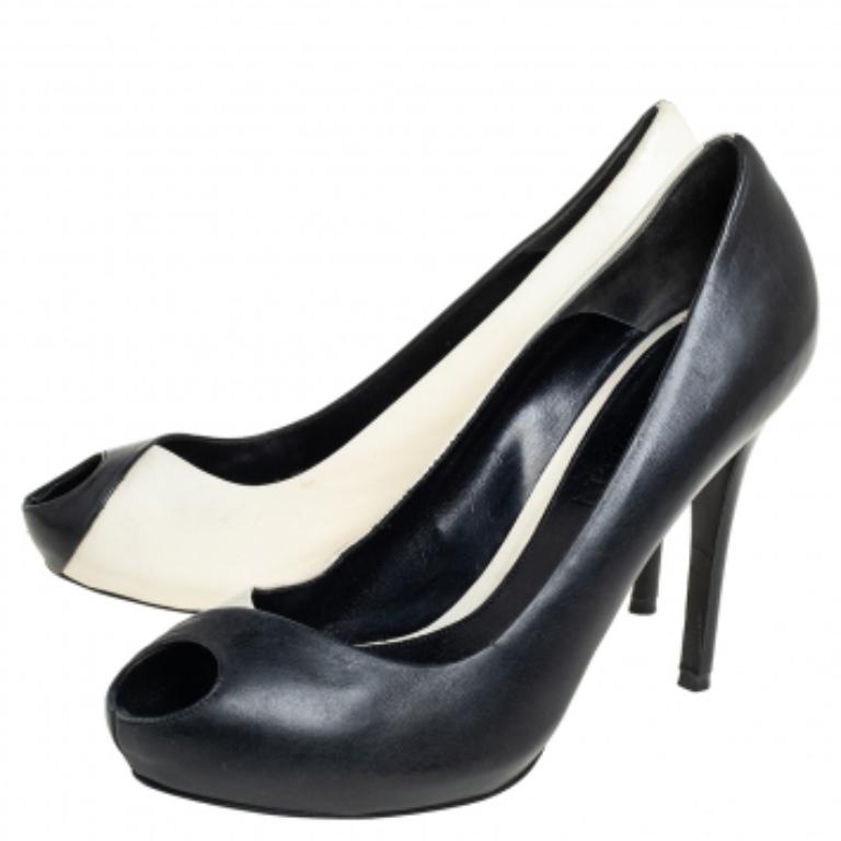 Alexander McQueen is known for its unique aesthetics and it well translates into these pumps. Crafted from leather, they come in black and white shades designed distinctively which makes them stand apart. These pumps are complete with peep-toes and