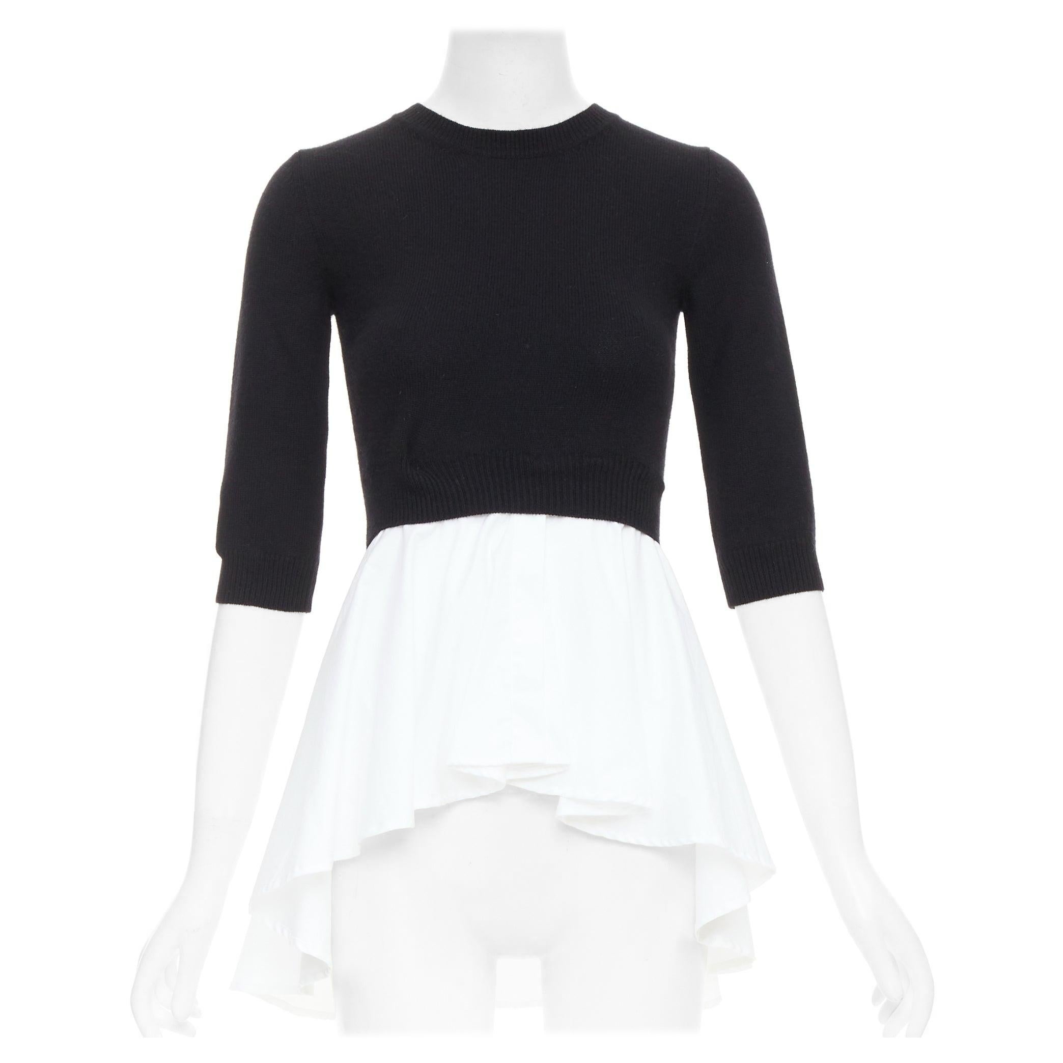 Alexander McQueen maglione nero in lana e cachemire, top peplo in cotone bianco XXS