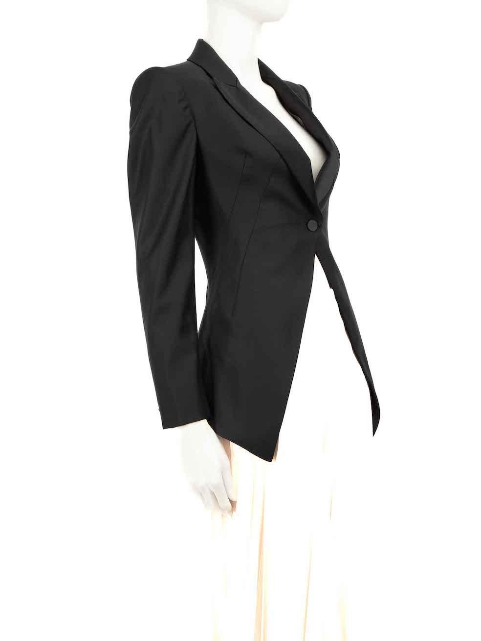 CONDITION is Very good. Minimal wear to blazer is evident. Small plucks to the weave of the silk lining on this used Alexander McQueen designer resale item.
 
 Details
 Black
 Wool
 Blazer
 Geometric cut detail
 Shoulder pads
 Button fastening
 2x