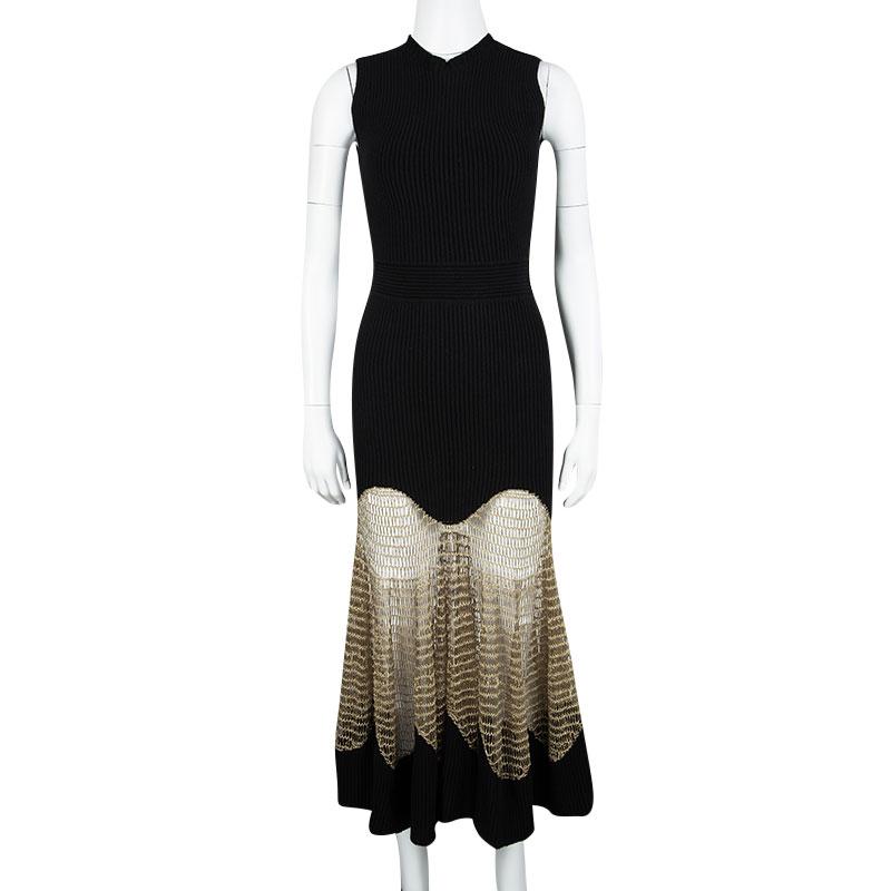 This visually stunning maxi dress is from Alexander McQueen and it delights with every detail on it. It is made from a blend of the finest materials and styled with metallic crochet lace on the skirt. A creation as splendid as this one deserves to
