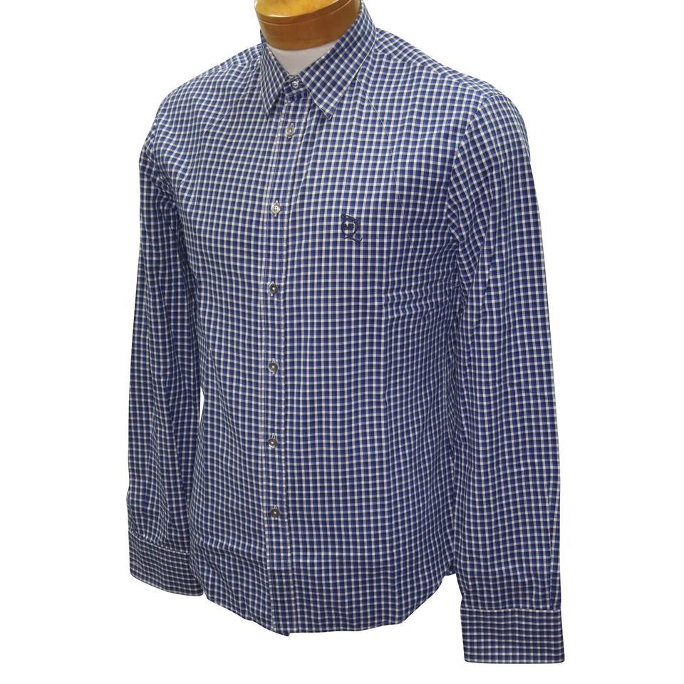 Alexander Mcqueen Blue Classic Mcq Plaid Button Down Long Sleeve SZ Small Shirt

This blue cotton button-down shirt from Alexander McQueen is a fine example of the label's contemporary approach to tailoring. In plaid, this shirt from Alexander