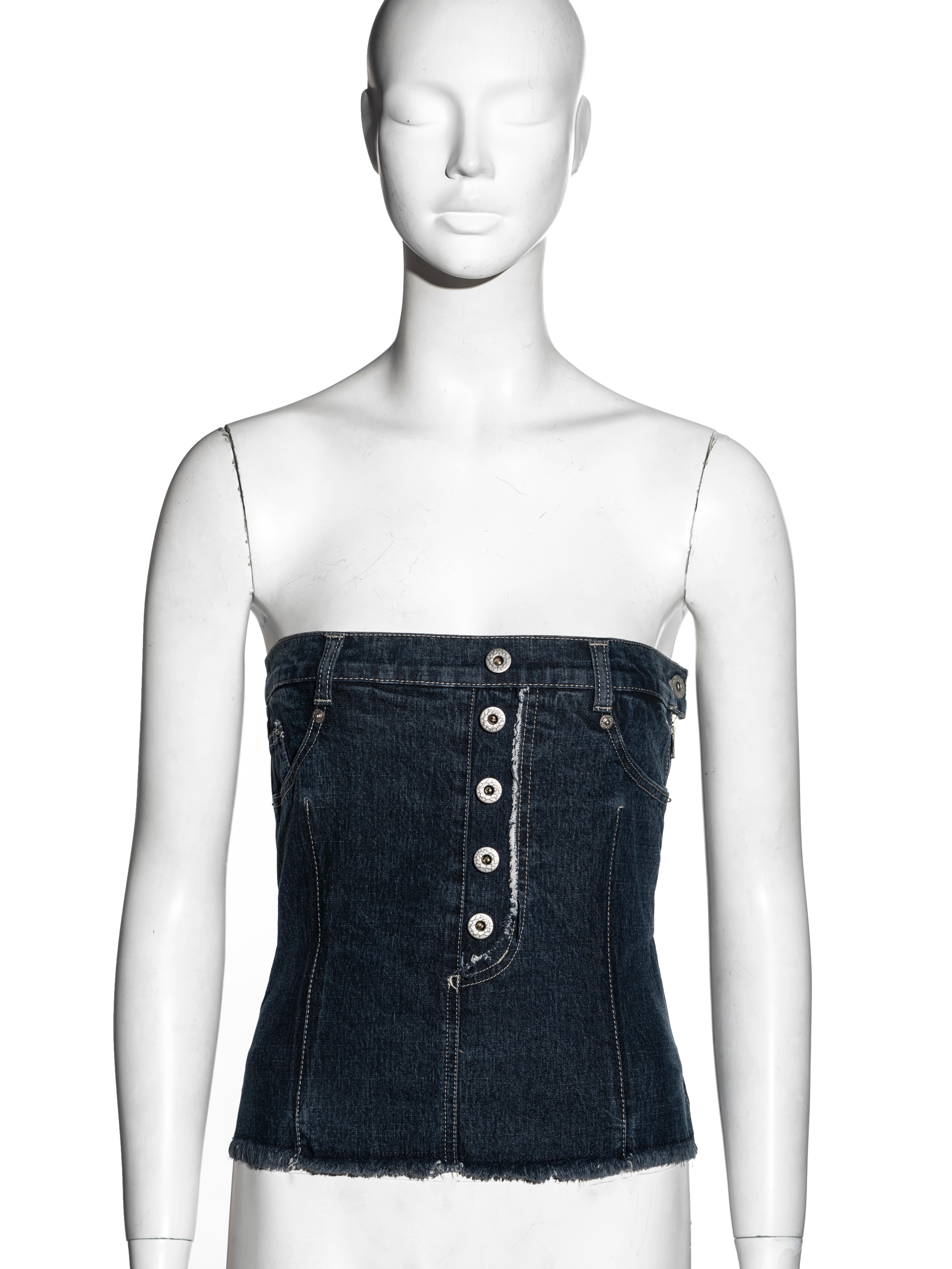 ▪ Alexander McQueen strapless corset top
▪ Washed blue denim
▪ Metal donut buttons 
▪ Built-in boning 
▪ Metal zipper at side opening 
▪ Belt loops and faux pockets 
▪ IT 38 - FR 34 - UK 6
▪ Fall-Winter 1996
▪ 83% Cotton, 15% Polyamide, 2% Elastic