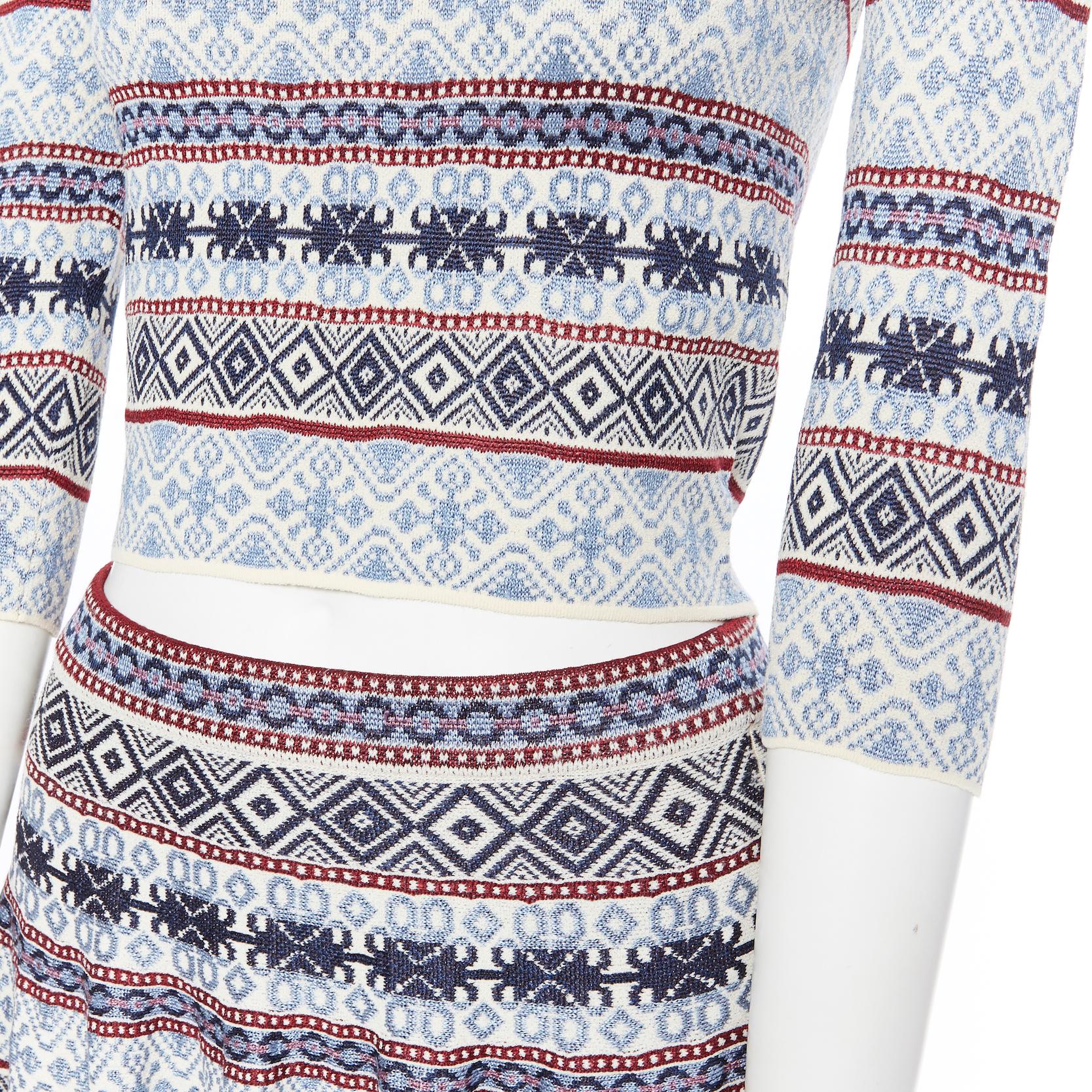 ALEXANDER MCQUEEN blue ethnic intarsia cropped top lace insert skirt dress M
Brand: Alexander Mcqueen
Designer: Sarah Burton
Model Name / Style: Knitted dress
Material: Silk blend
Color: Blue
Pattern: Other; ethnic pattern
Extra Detail: Lace insert