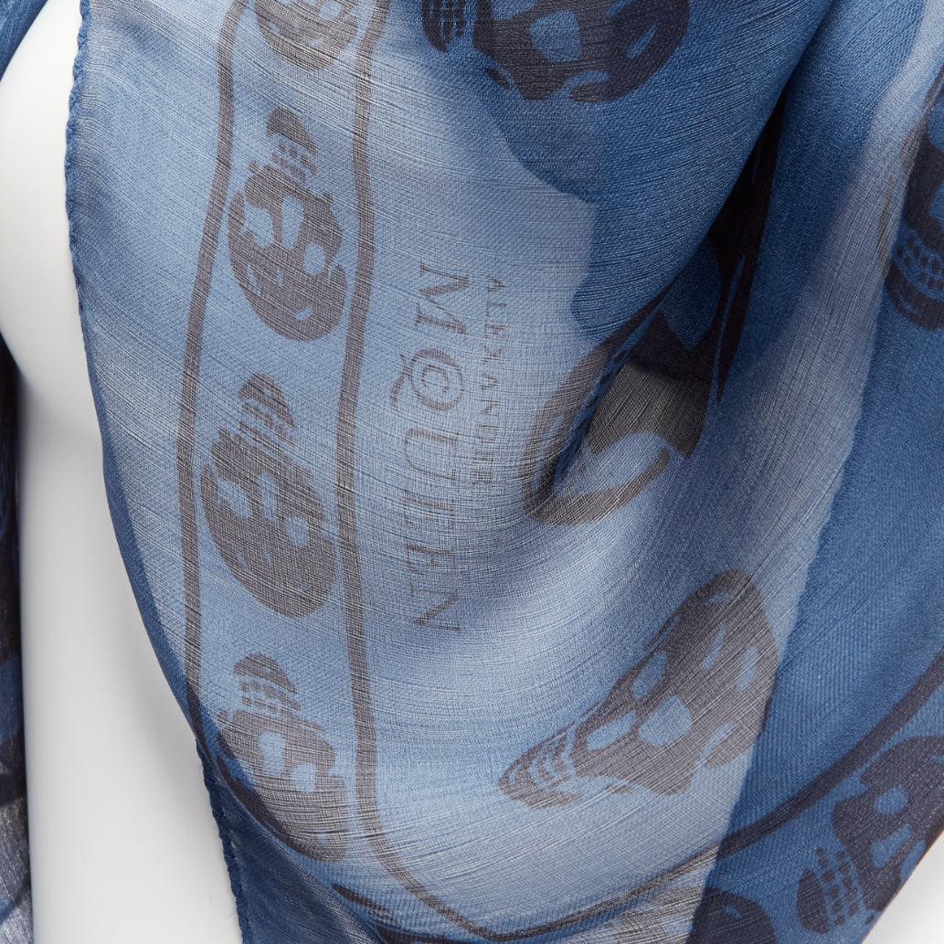 ALEXANDER MCQUEEN blue navy skull logo print 100% silk scarf
Reference: SNKO/A00349
Brand: Alexander McQueen
Material: Silk
Color: Blue, Navy
Pattern: Abstract
Extra Details: Logo at edge of scarf.
Made in: Italy

CONDITION:
Condition: Good, this