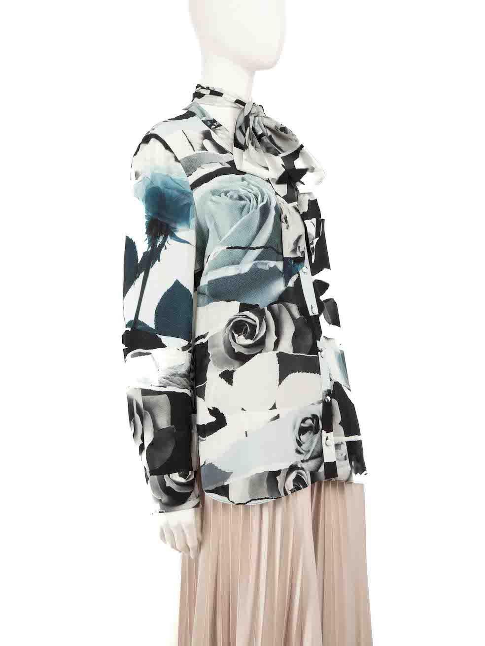 CONDITION is Very good. Minimal wear to blouse is evident. Minimal pulls to the weave on the sleeves on this used Alexander McQueen designer resale item.
 
 
 
 Details
 
 
 Blue
 
 Silk
 
 Blouse
 
 Torn Rose print
 
 Long sleeves
 
 Front neck