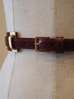 Alexander McQueen bordeaux leather gold hardware belt