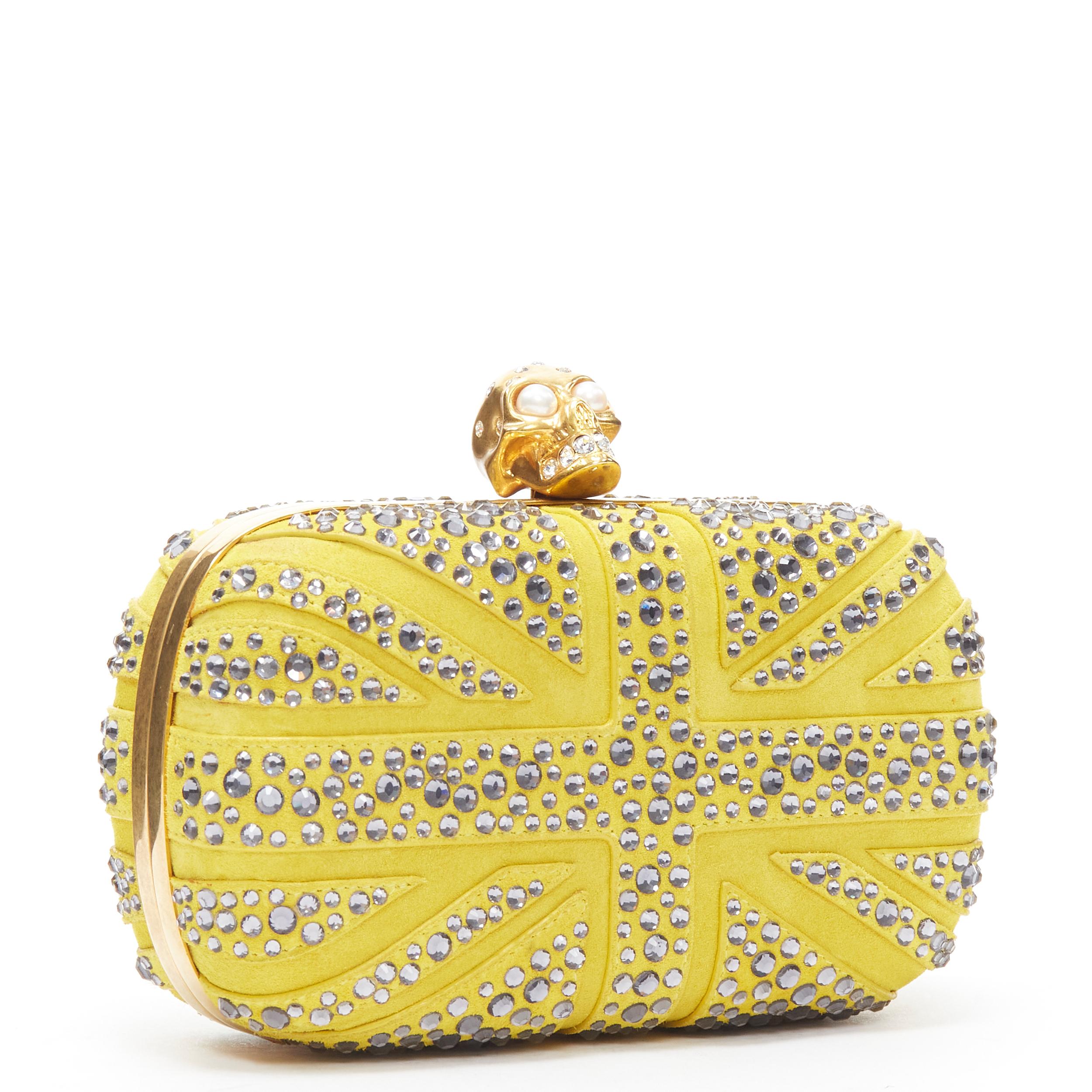 ALEXANDER MCQUEEN Britannia yellow suede blue crystal gold Pearl skull box clutch bag 
Reference: TGAS/B02173 
Brand: Alexander McQueen 
Model: Britannia Clutch 
Material: Suede 
Color: Yellow 
Pattern: Solid 
Closure: Clasp 
Extra Detail: Britannia