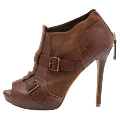 Alexander McQueen Botas al tobillo de piel marrón con hebilla talla 39