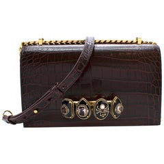 Alexander McQueen Burgundy Crocodile Embossed Crystal Knuckle Bag