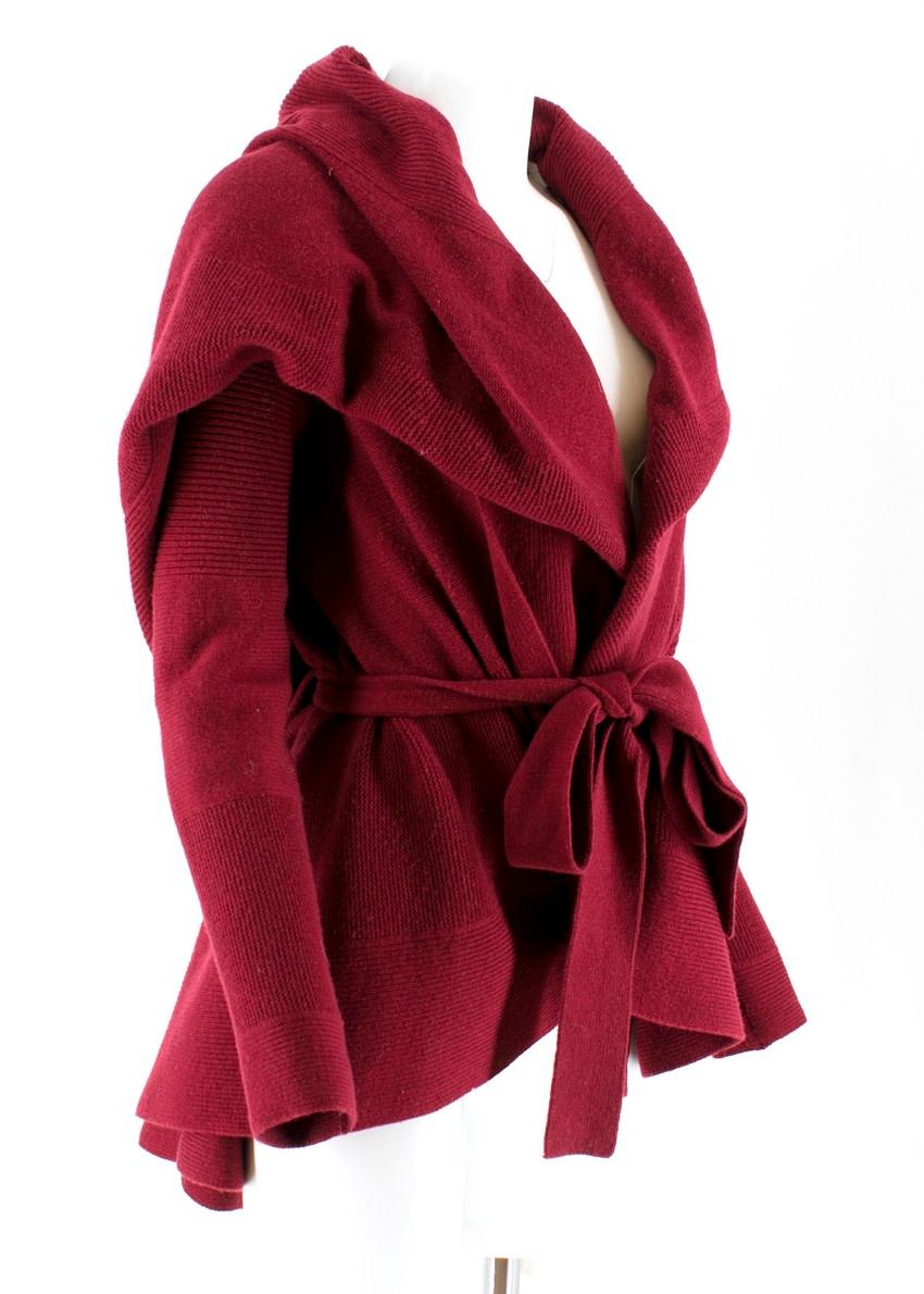 Alexander McQueen Burgundy Wool Cardigan

-Burgundy belted cardigan
-Oversized collar
-Two front pockets
-Multiple ribbed details
-Popper closure

Please note, these items are pre-owned and may show signs of being stored even when unworn and unused.
