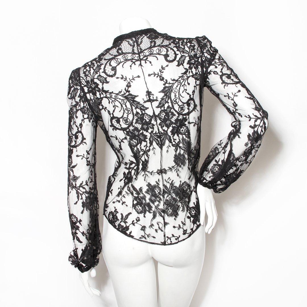 Button-down shirt by Alexander McQueen 
Black
Lace
Long-sleeve
Sheer
Button-down front closure
Black buttons
Made in Italy
Condition: Great, few small white spots on the left front and sleeve (see photos)
 Size/Measurements: (approximate, taken