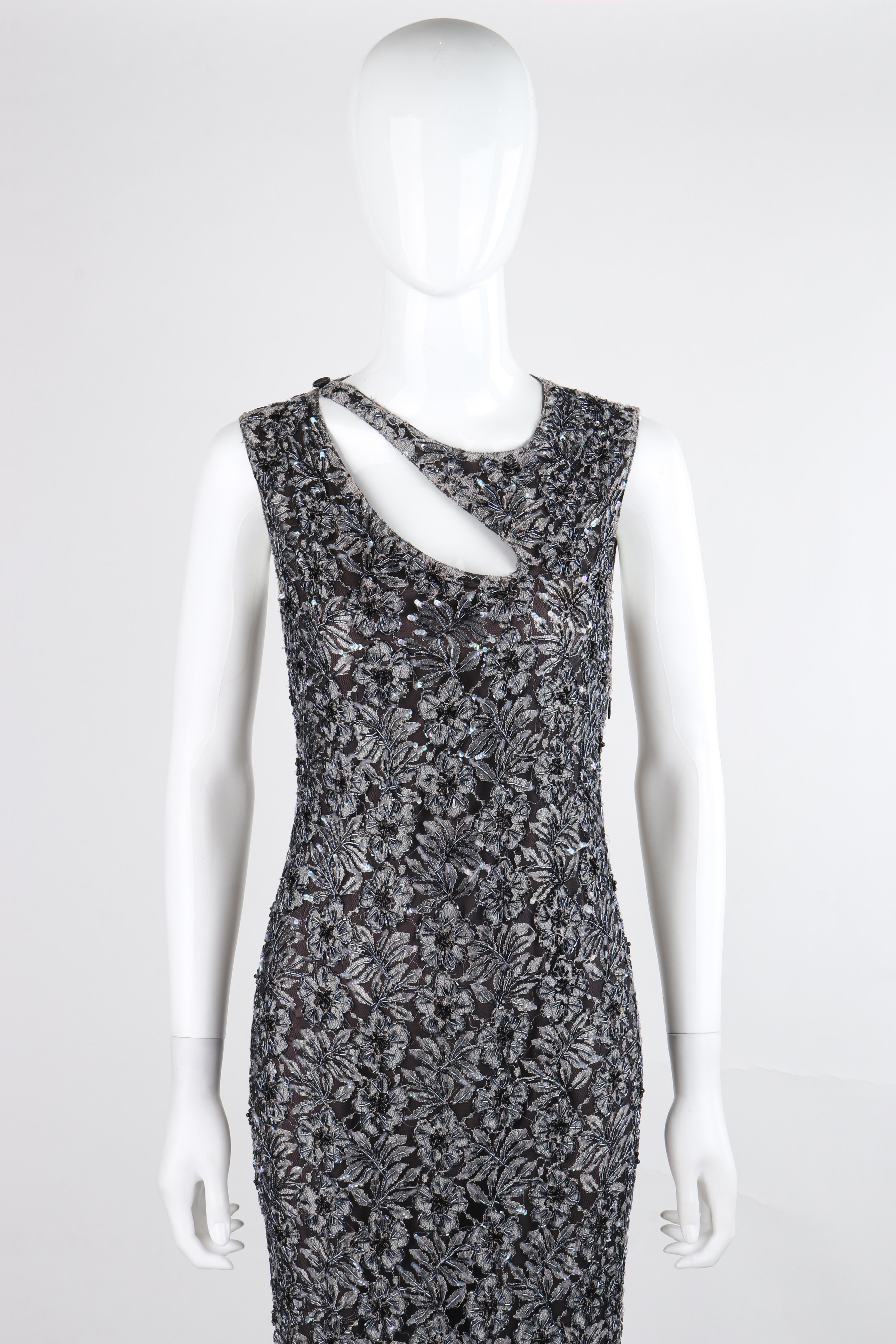 ALEXANDER McQUEEN c.1999 Vtg Grey Silver Sequin Beaded Lace Embellished Cutout Dress

Brand / Manufacturer: Alexander McQueen
Circa: 1999
Designer: Alexander McQueen
Style: Sleeveless dress
Color(s): Shades of grey and silver
Lined: Yes
Unmarked