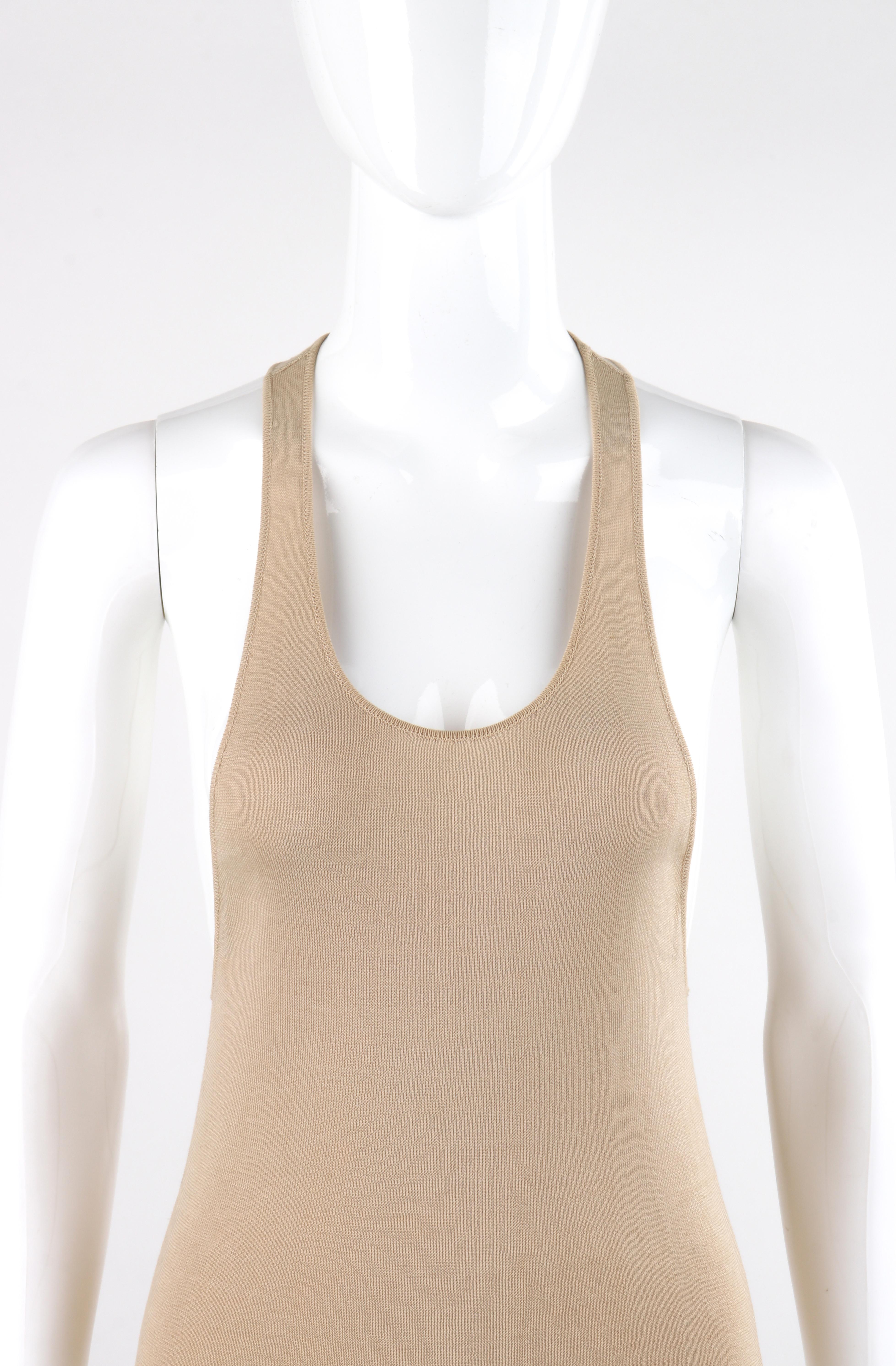 ALEXANDER McQUEEN c.2000’s Tan Scoop Neck Low Cut Side Racerback Knit Tank Top
 
Brand / Manufacturer: Alexander McQueen
Circa: 2000’s 
Designer: Alexander McQueen
Style: Sleeveless knit racerback top
Color(s): Tan
Lined: No
Unmarked Fabric Content